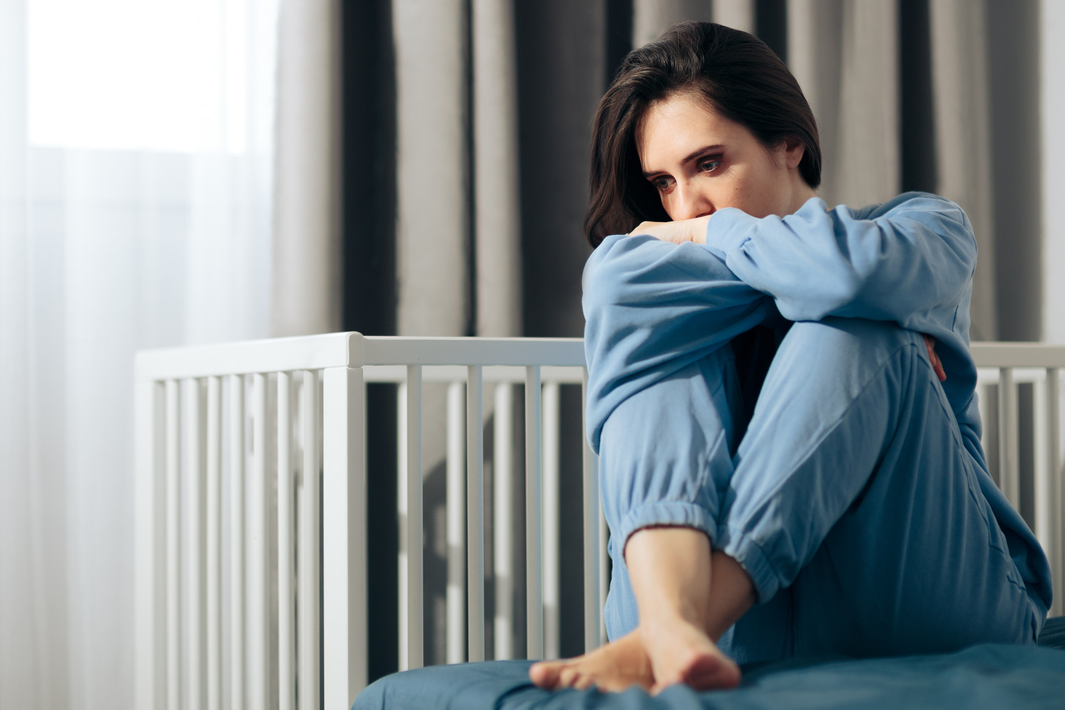 Unhappy Woman Suffering from Post-Partum Depression