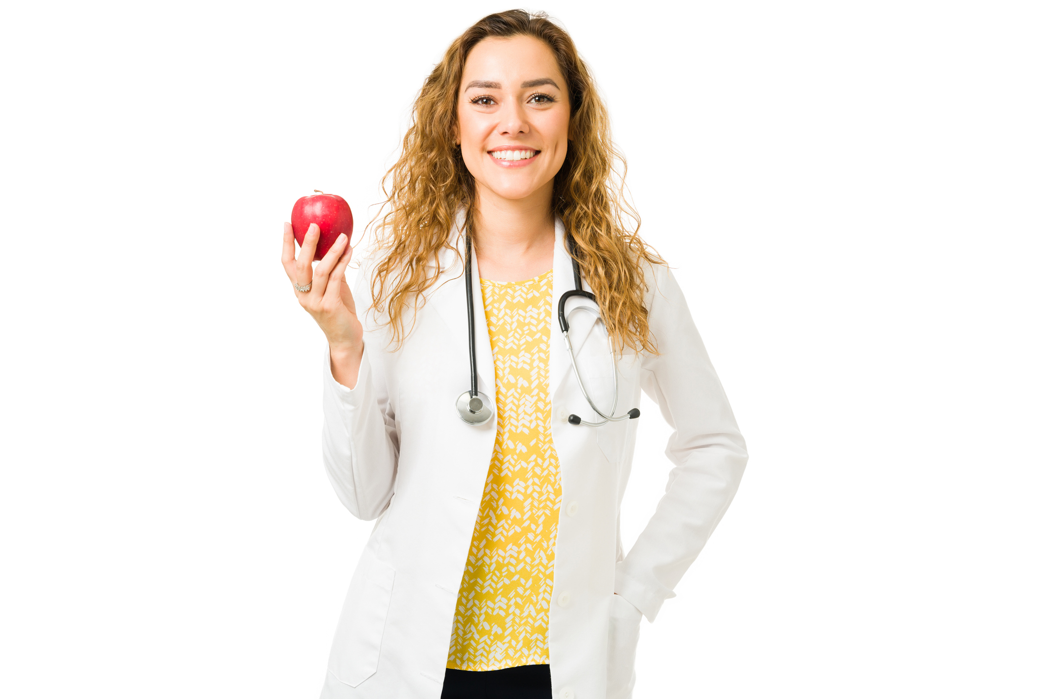 Hispanic professional nutritionist posing in a white background