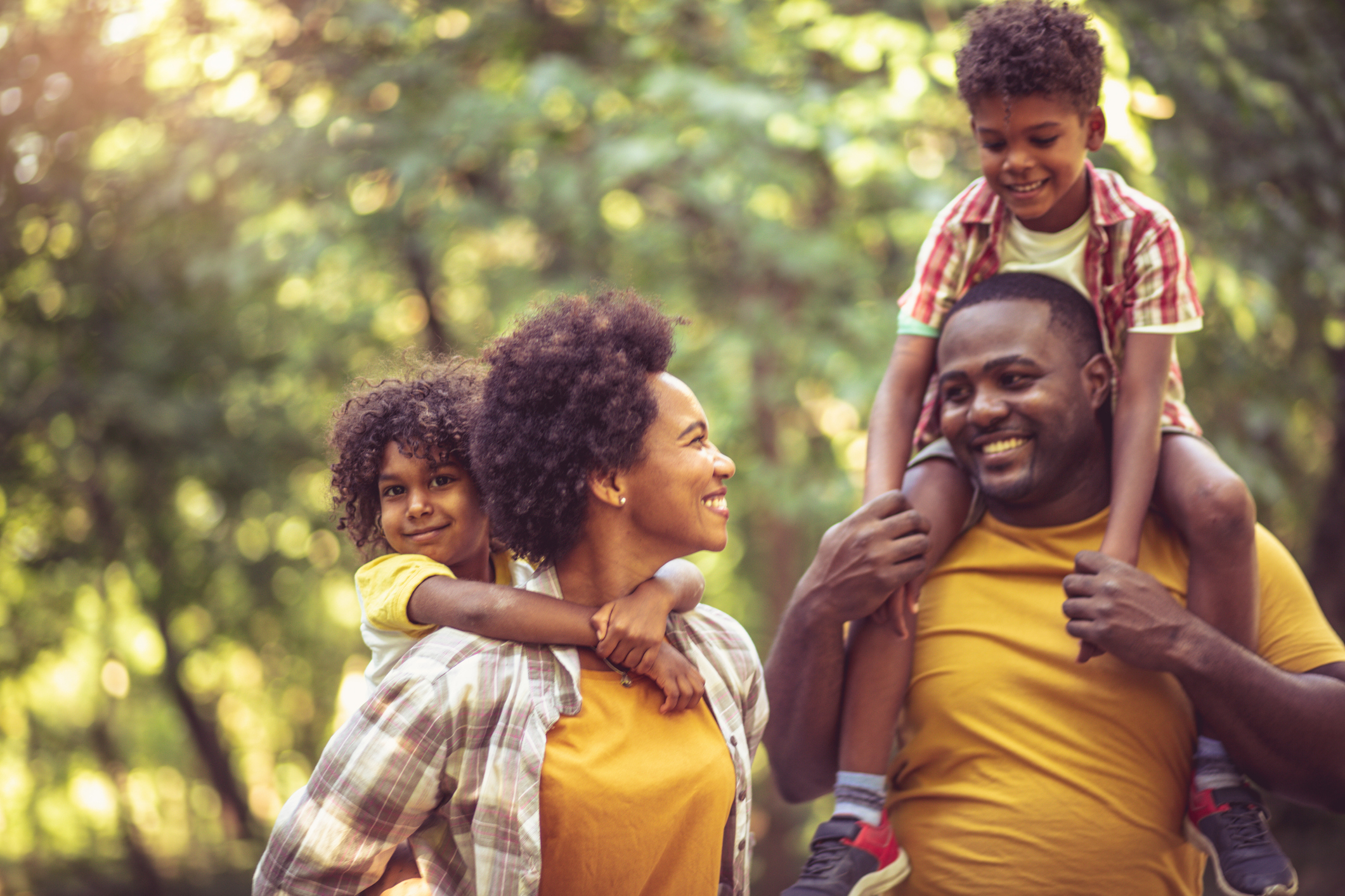 African American family having fun outdoors.