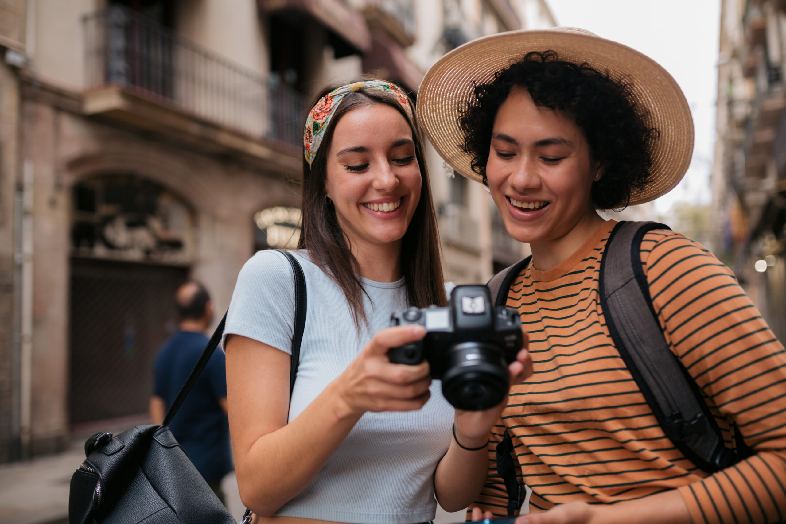 Happy diverse lesbian couple on a vacation together