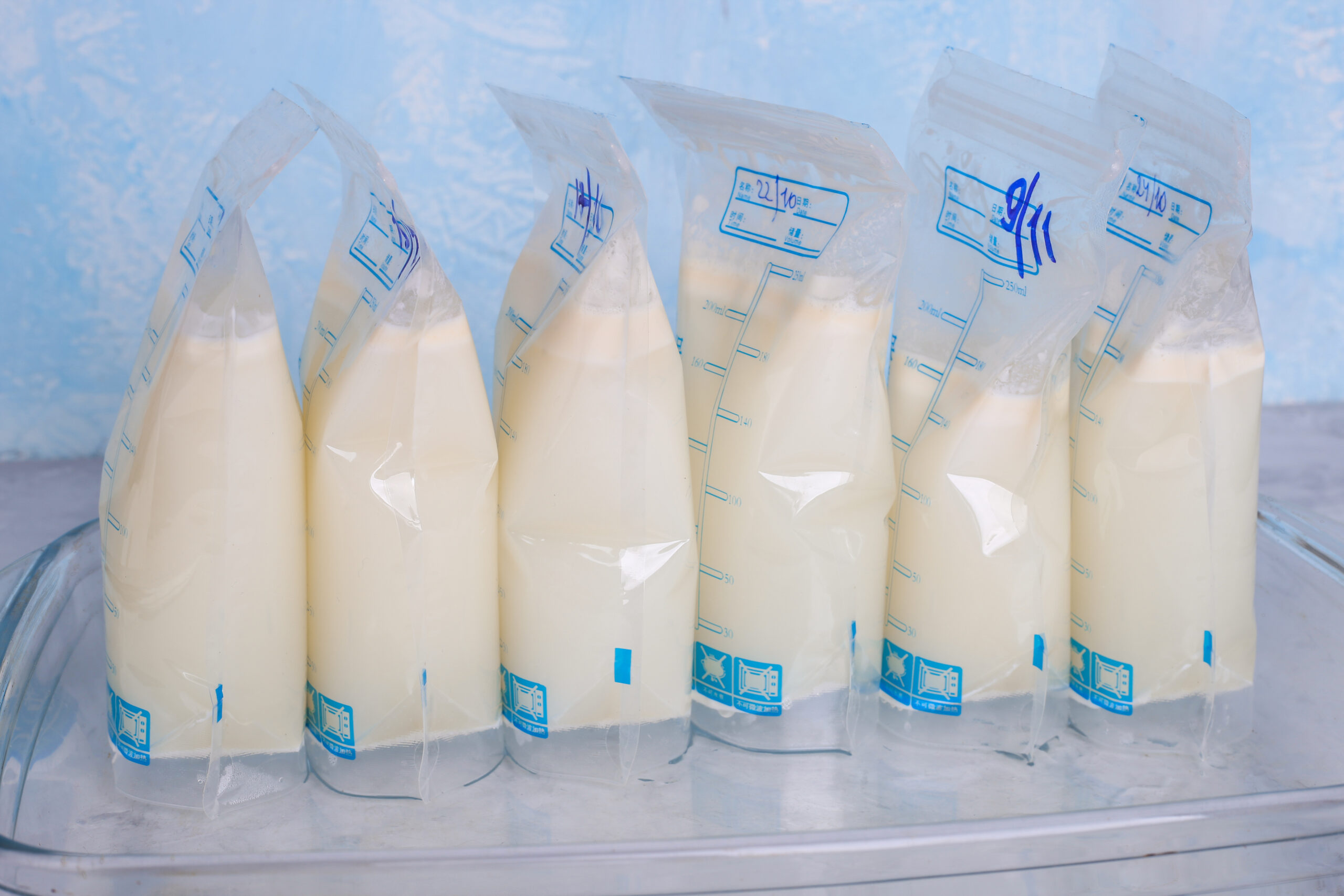 bags with breast milk. Milk bank. Expressing breast milk. Breast-feeding. Freezing and storing milk. Donated milk.