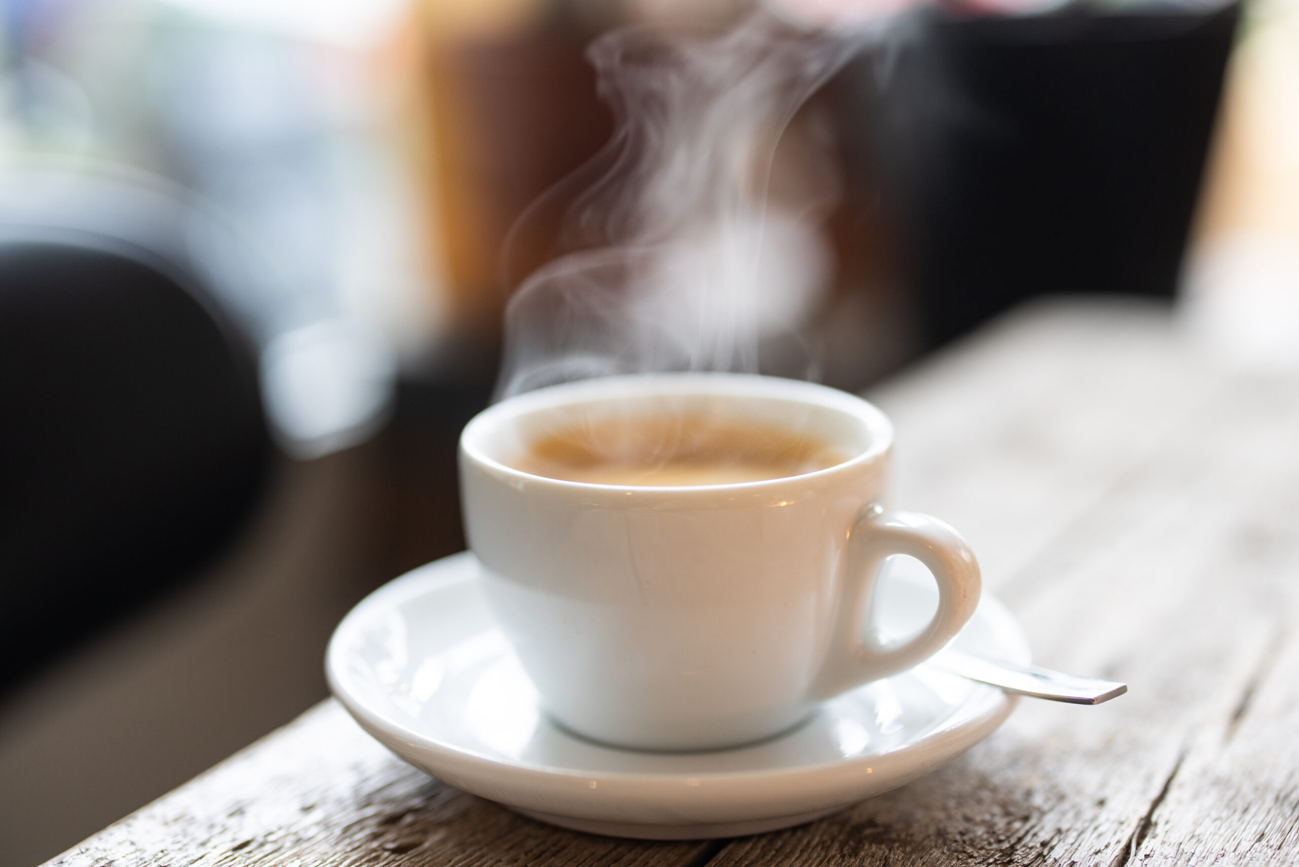 Refreshing hot cup of coffee at a cafe