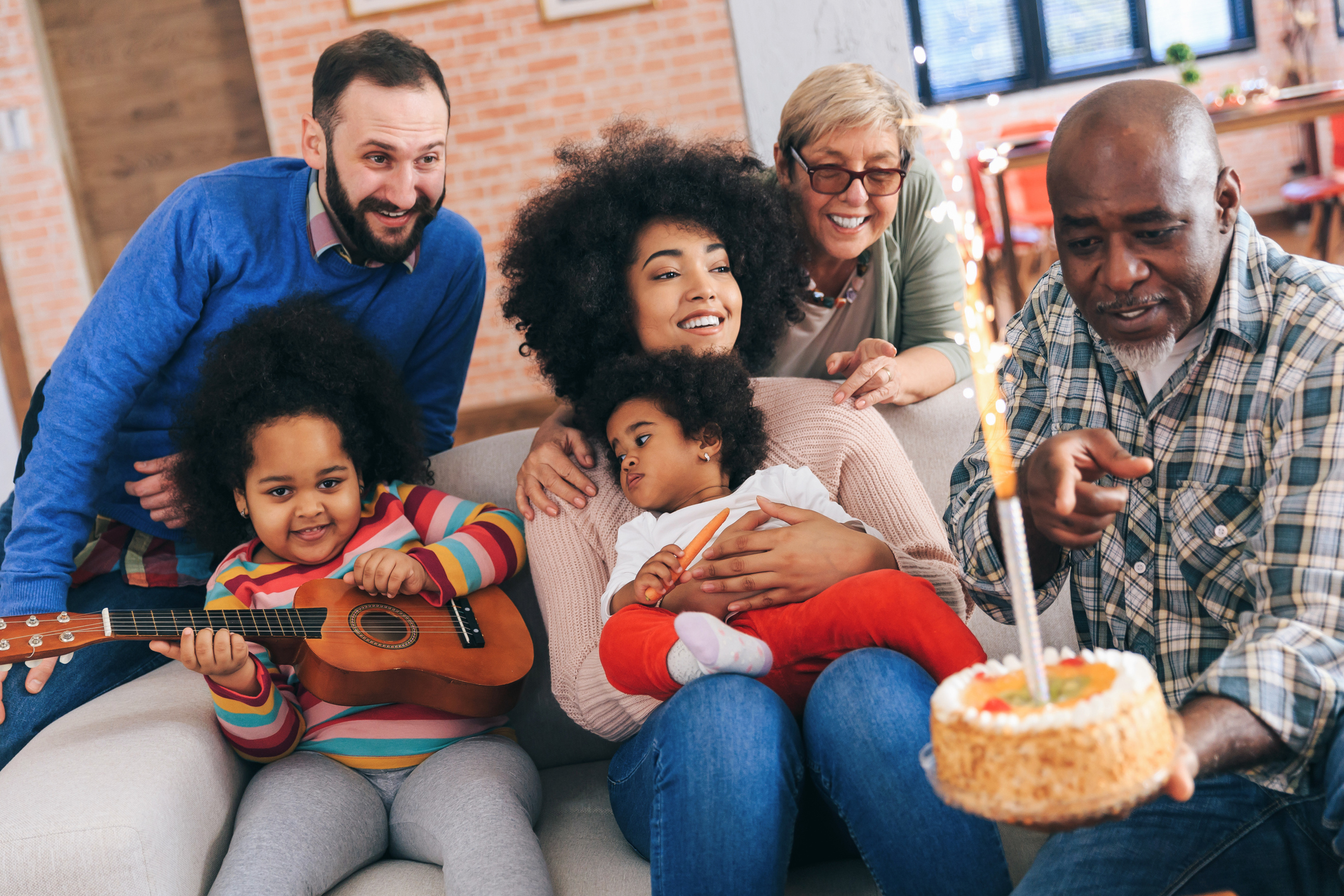 Portrait of Multi-Ethnic family celebrating birthday party