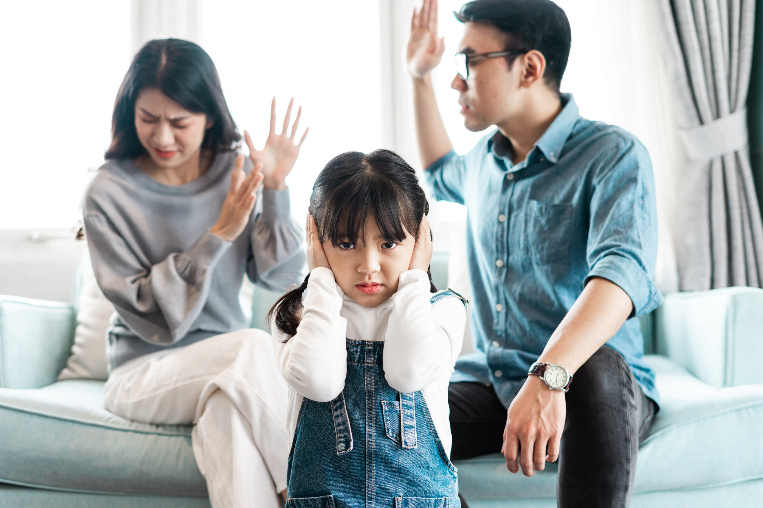 small asian family portrait at home