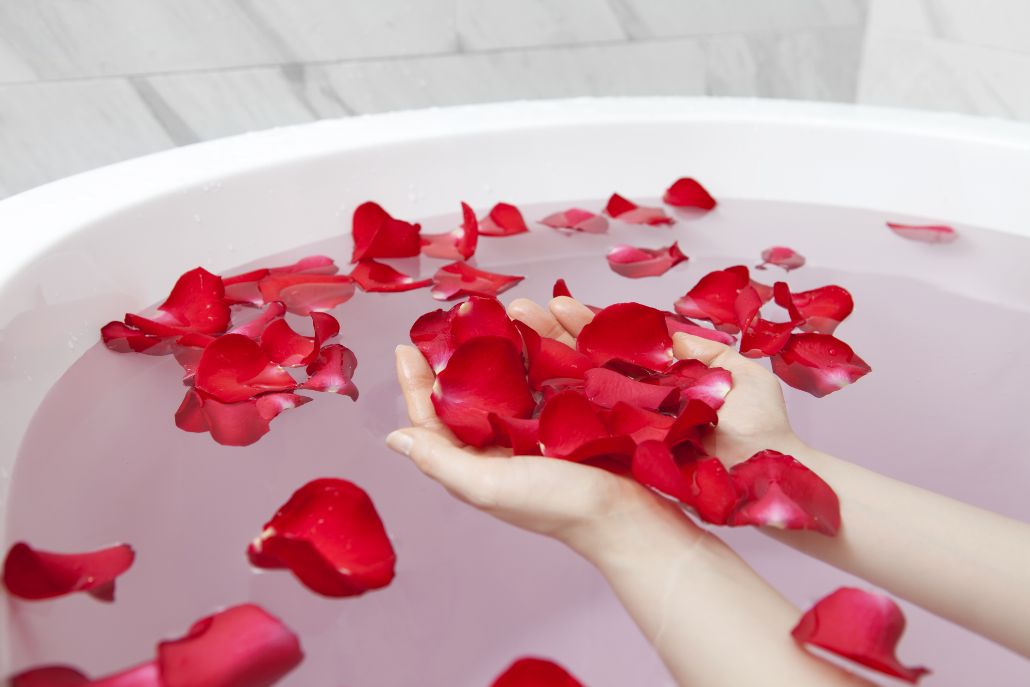 bathtub with rose petals