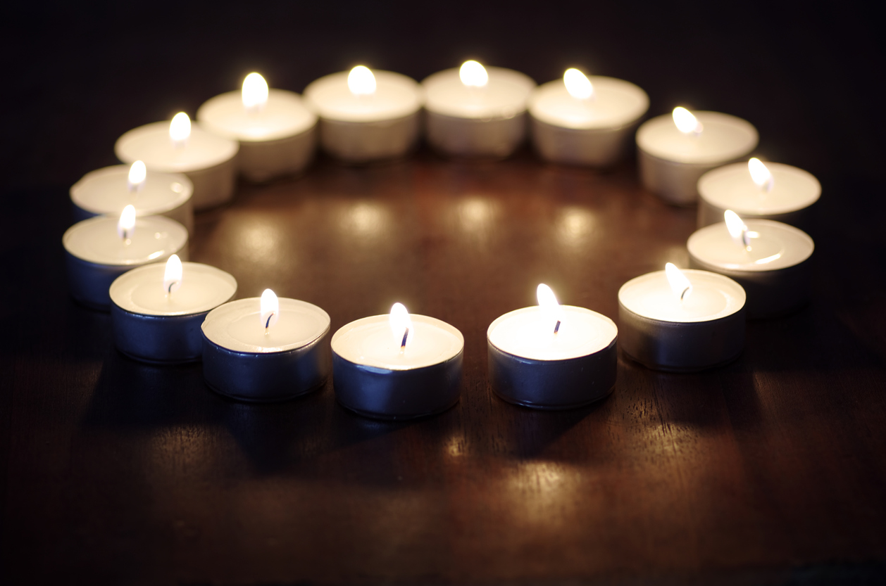 Candles On Polished Wood