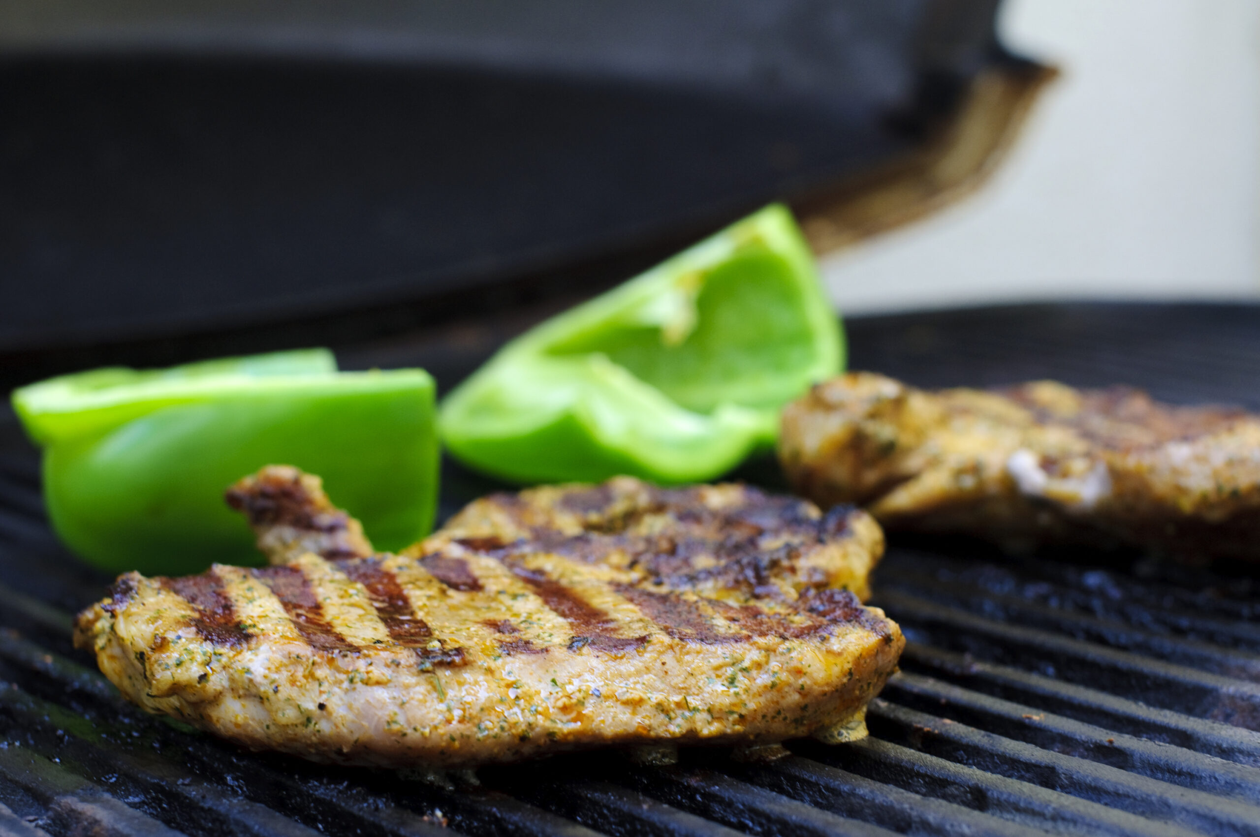 Steaks on barbecue grill