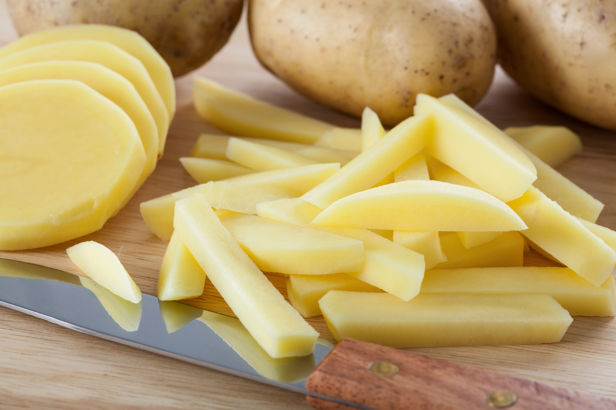 Cutting potatoes into chips