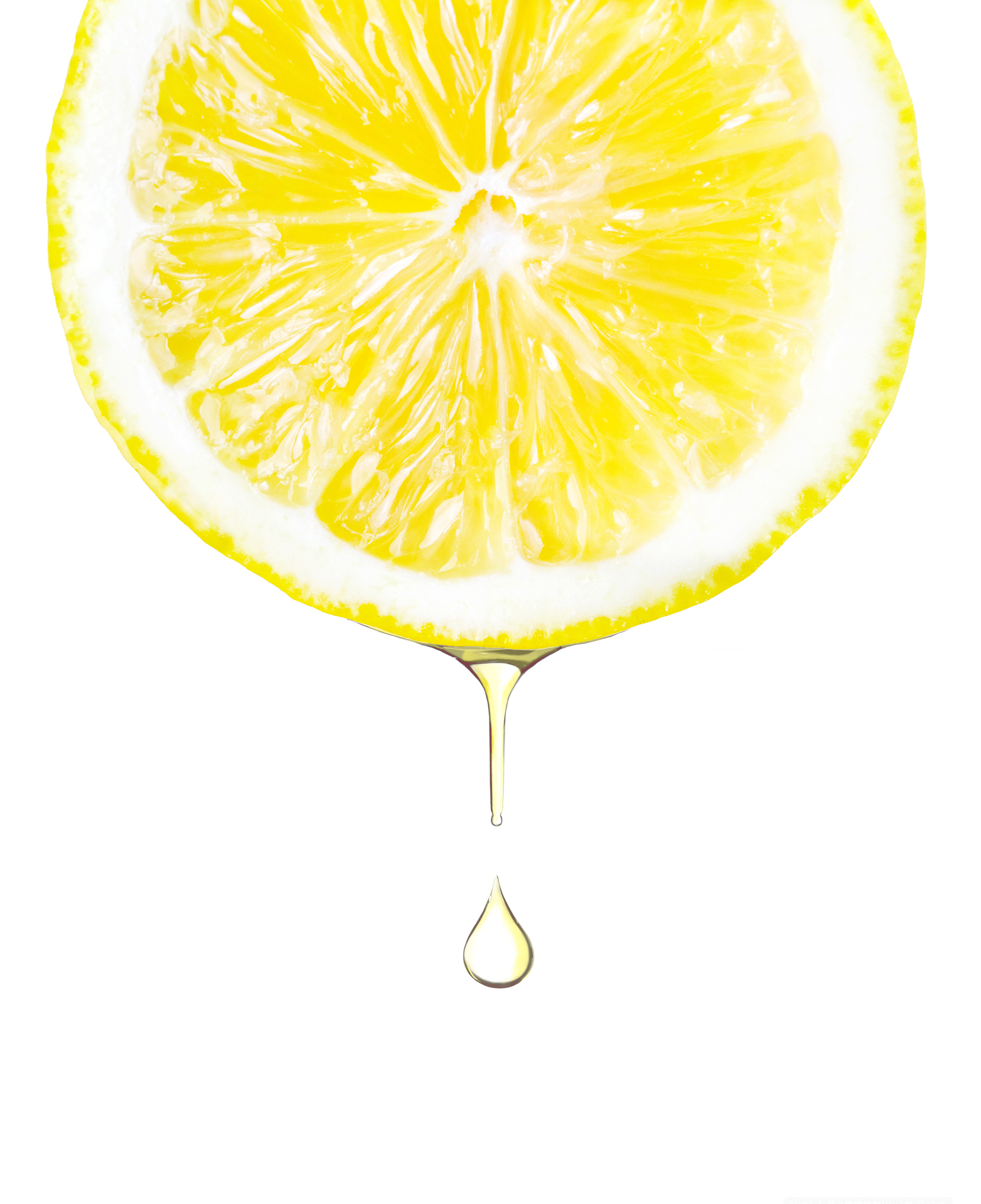 Sliced lemon with juice dropping. Isolated on white