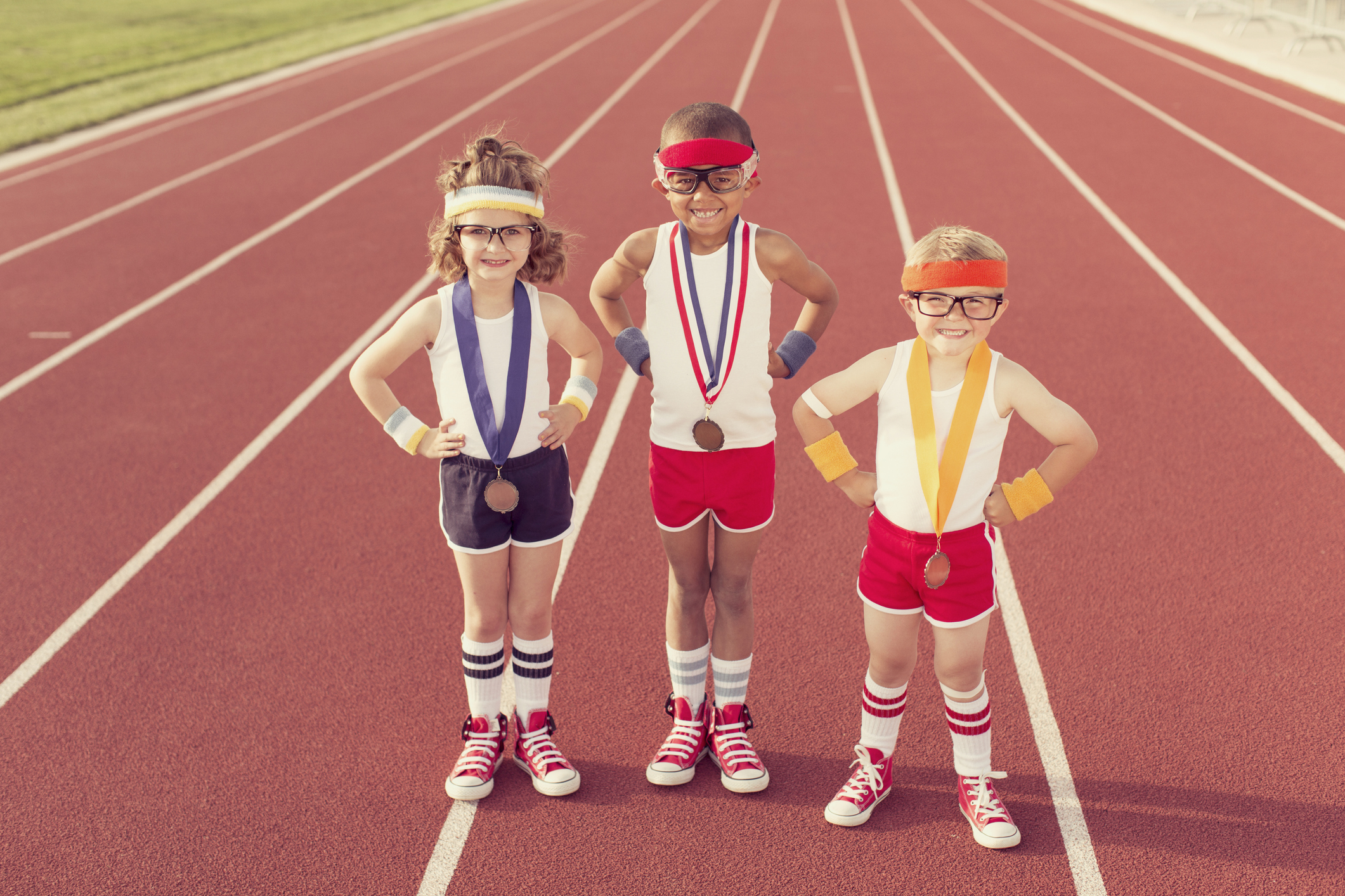 Children Dressed as Nerds at Track Wearing Medals