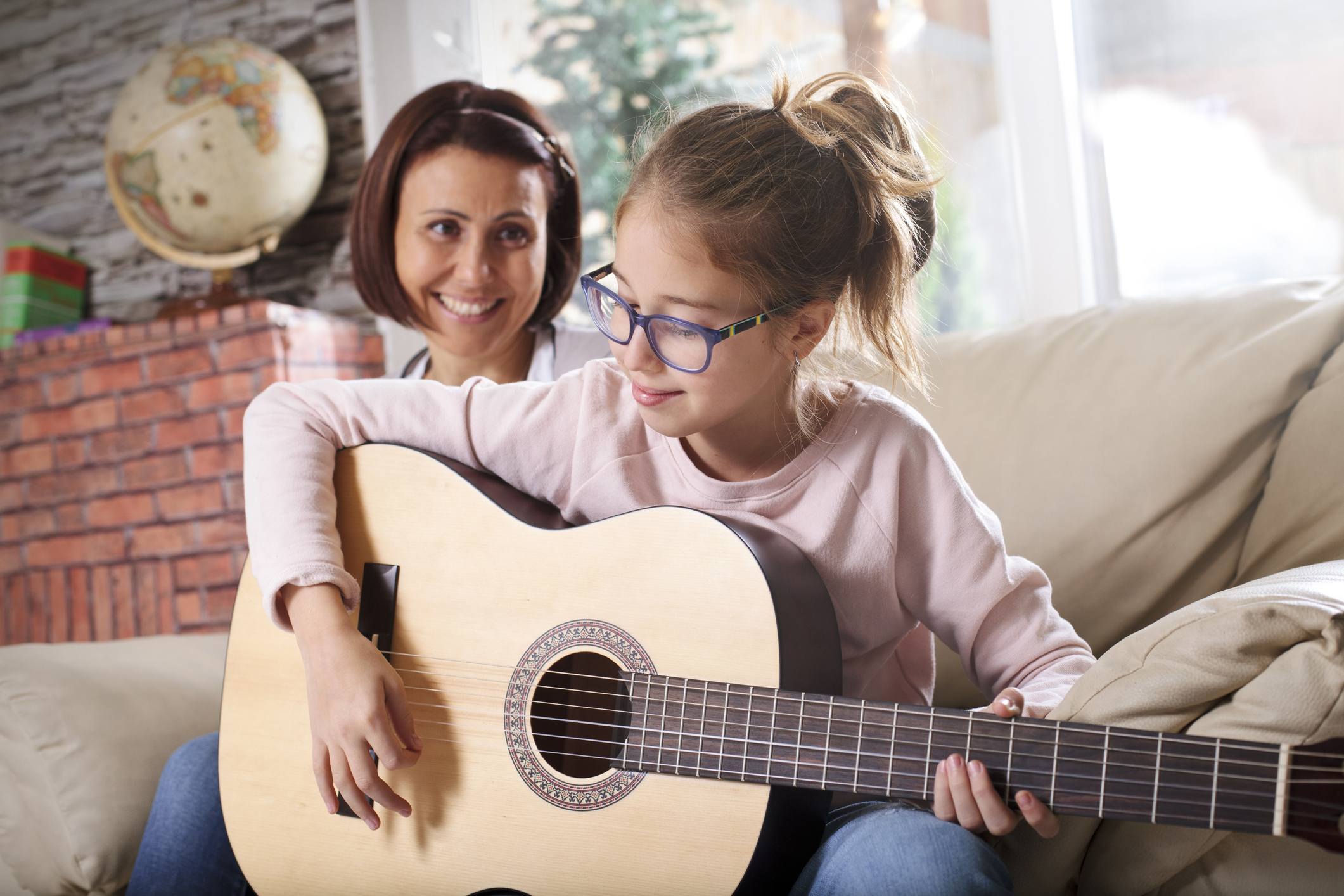 Girl playing guitar