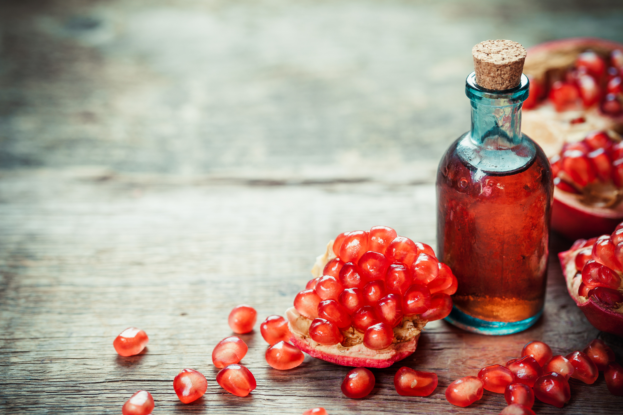 Pomegranate tincture or  juice and red ripe garnet fruit