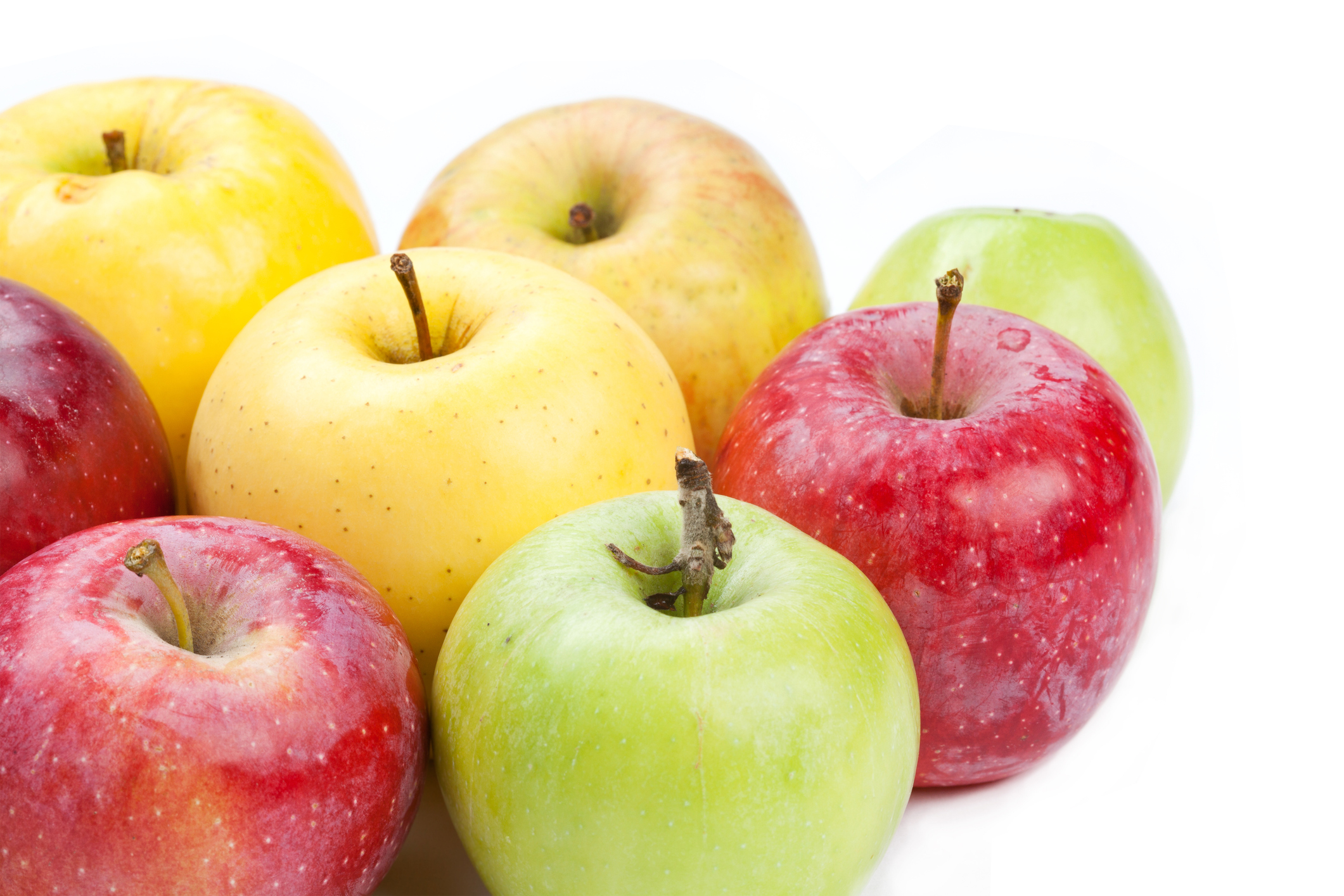 Multi colored apples  different varieties. White background. macro view