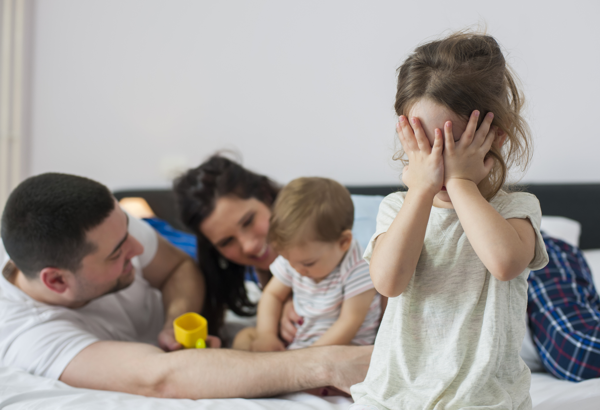 Little girl annoyed with his family