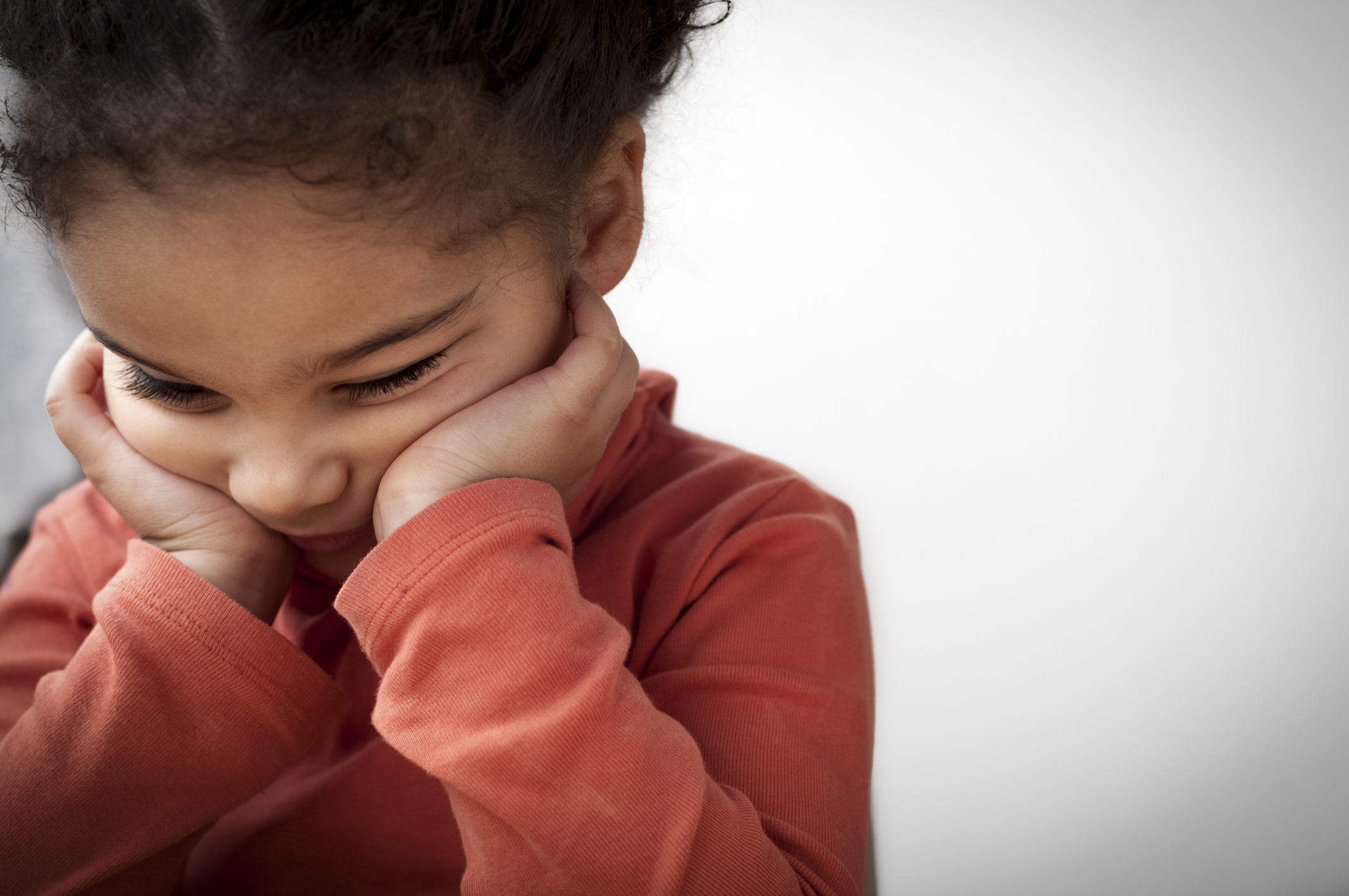 Unhappy Child (4-5)  With Her Head in Hands