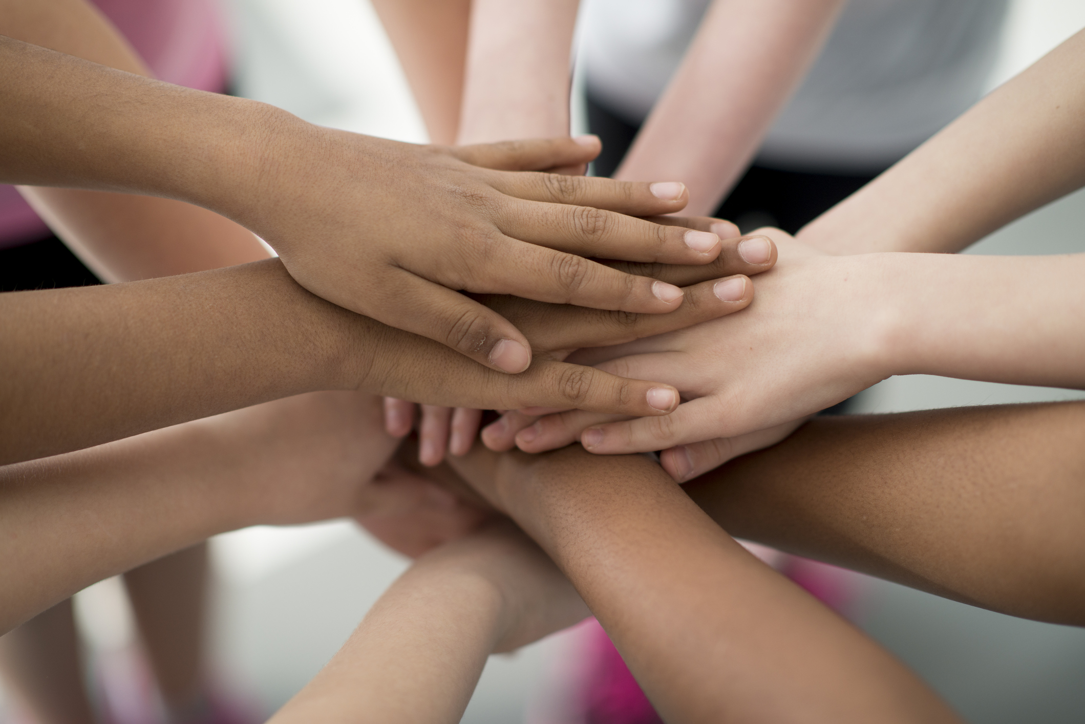 Hands Together in a Huddle