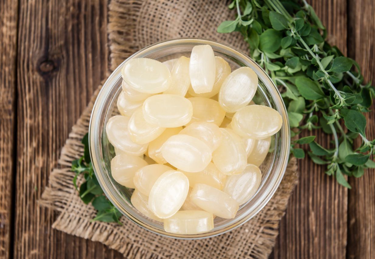 Menthol Candies on wooden background