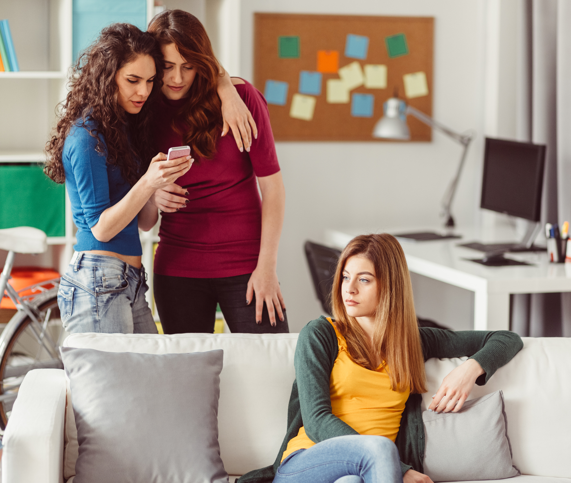 Women gossiping together