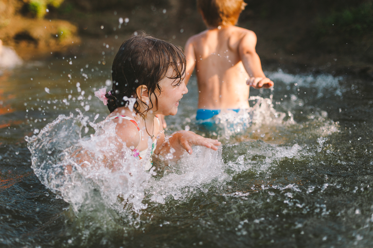 Children playing in a river