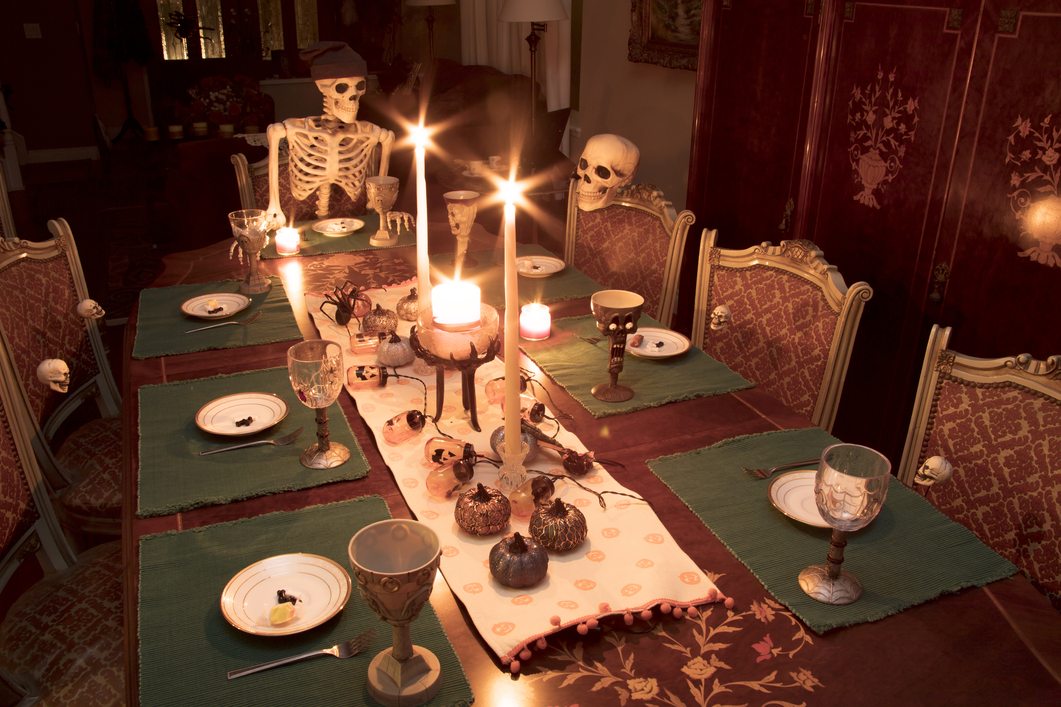 Halloween Skeleton Family Celebrating a Holiday Dinner