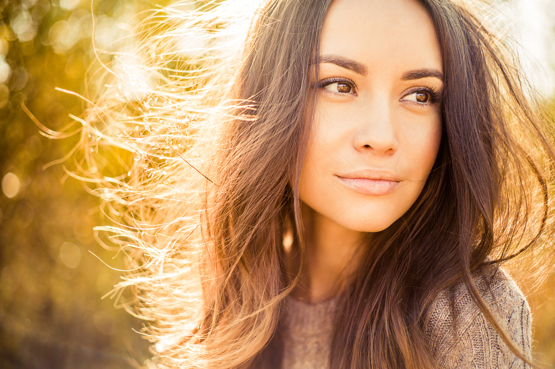 Beautiful lady in autumn landscape