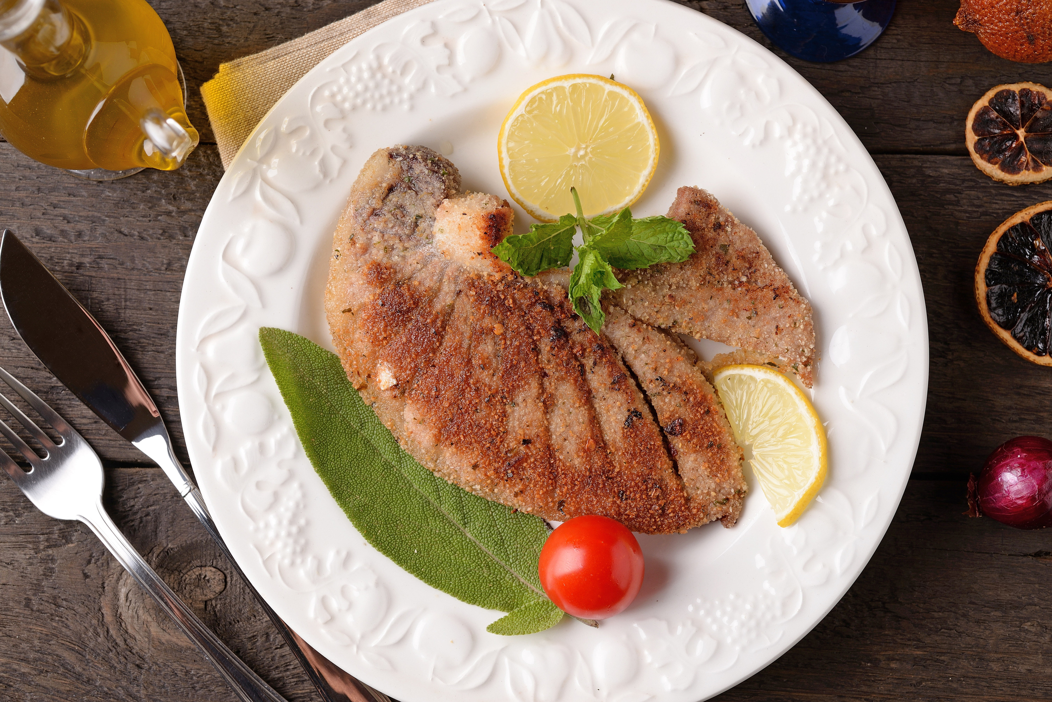 Grilled tuna steak on a white plate