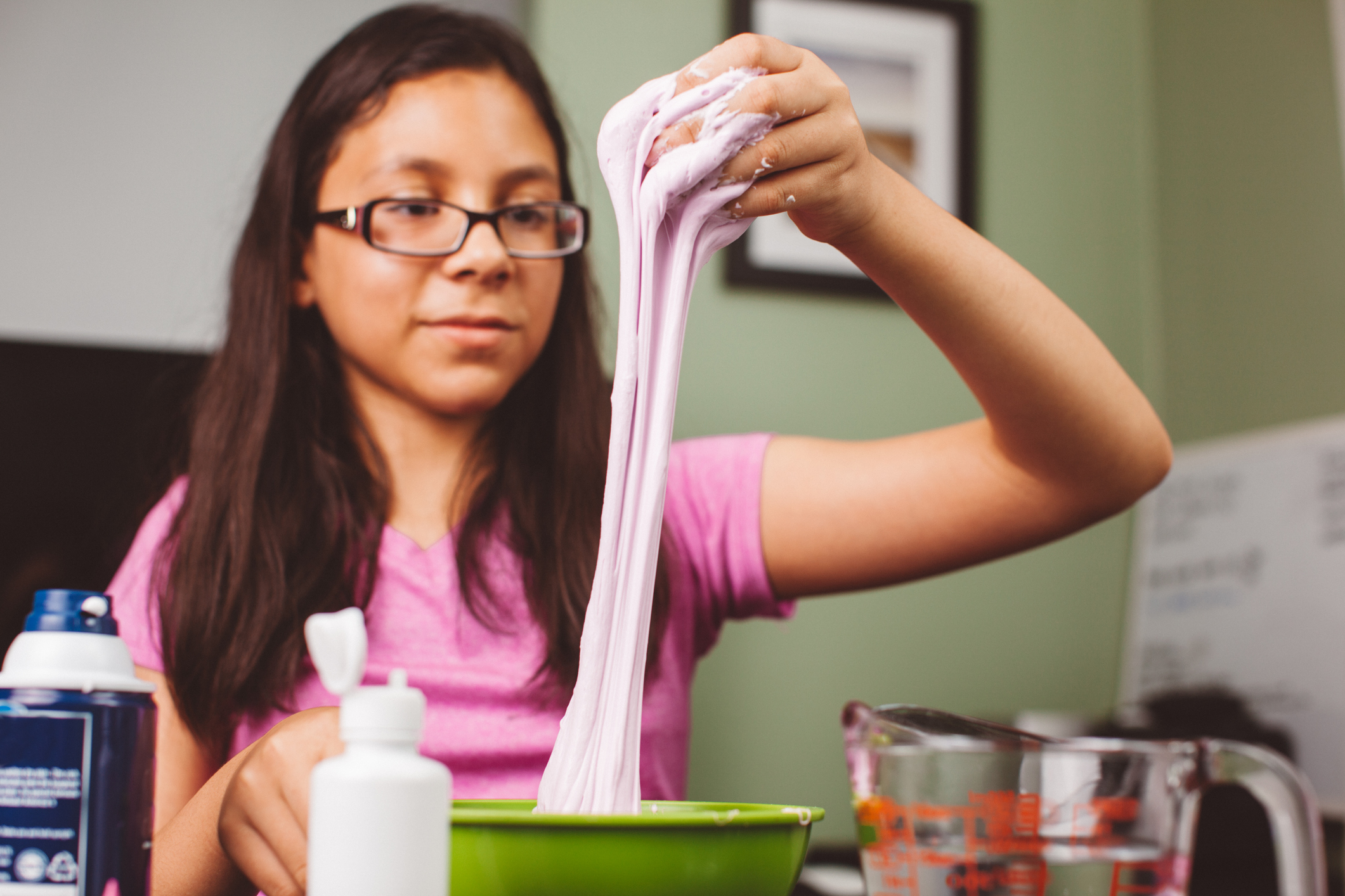 young child doing a science experiment