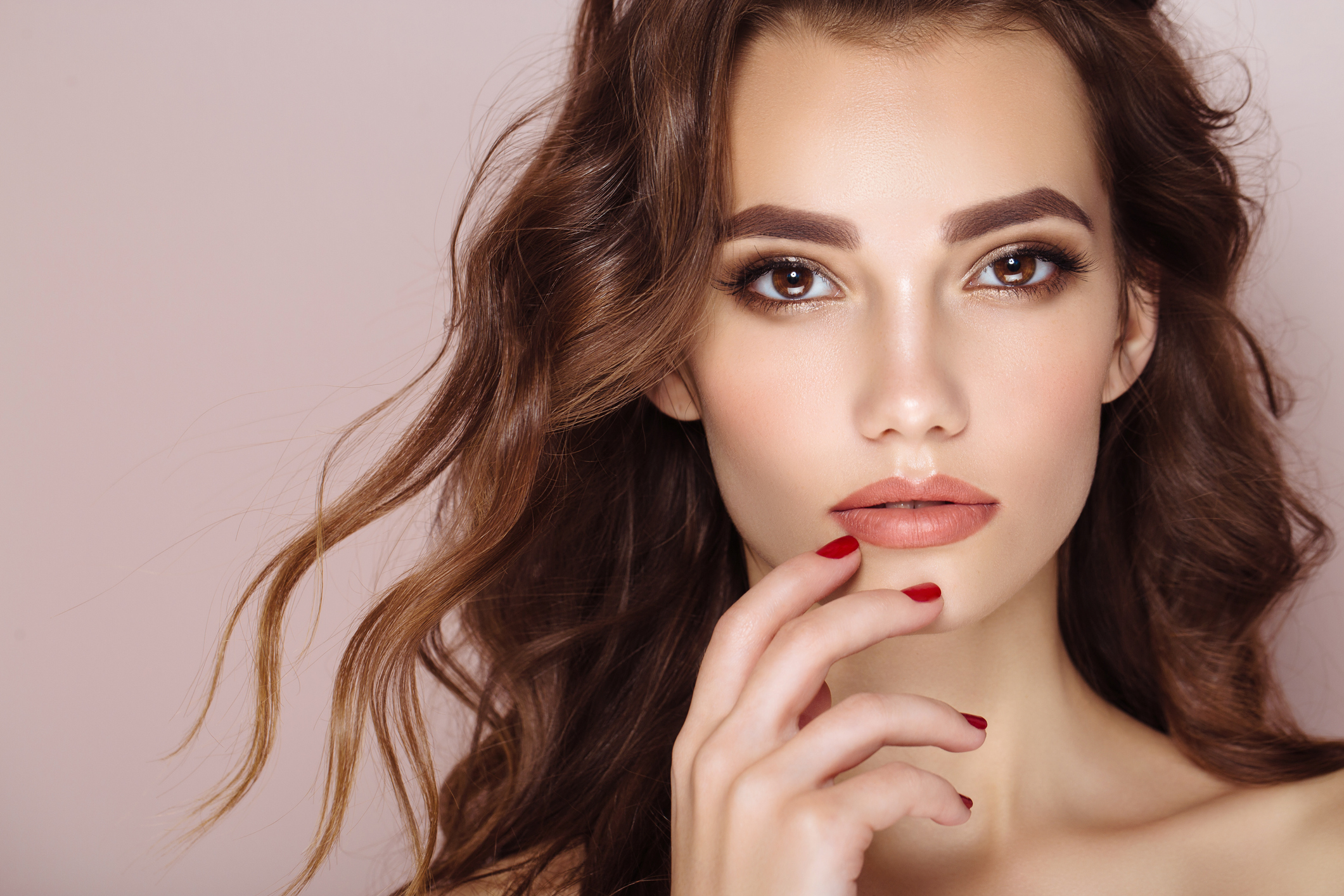 Studio shot of young beautiful woman