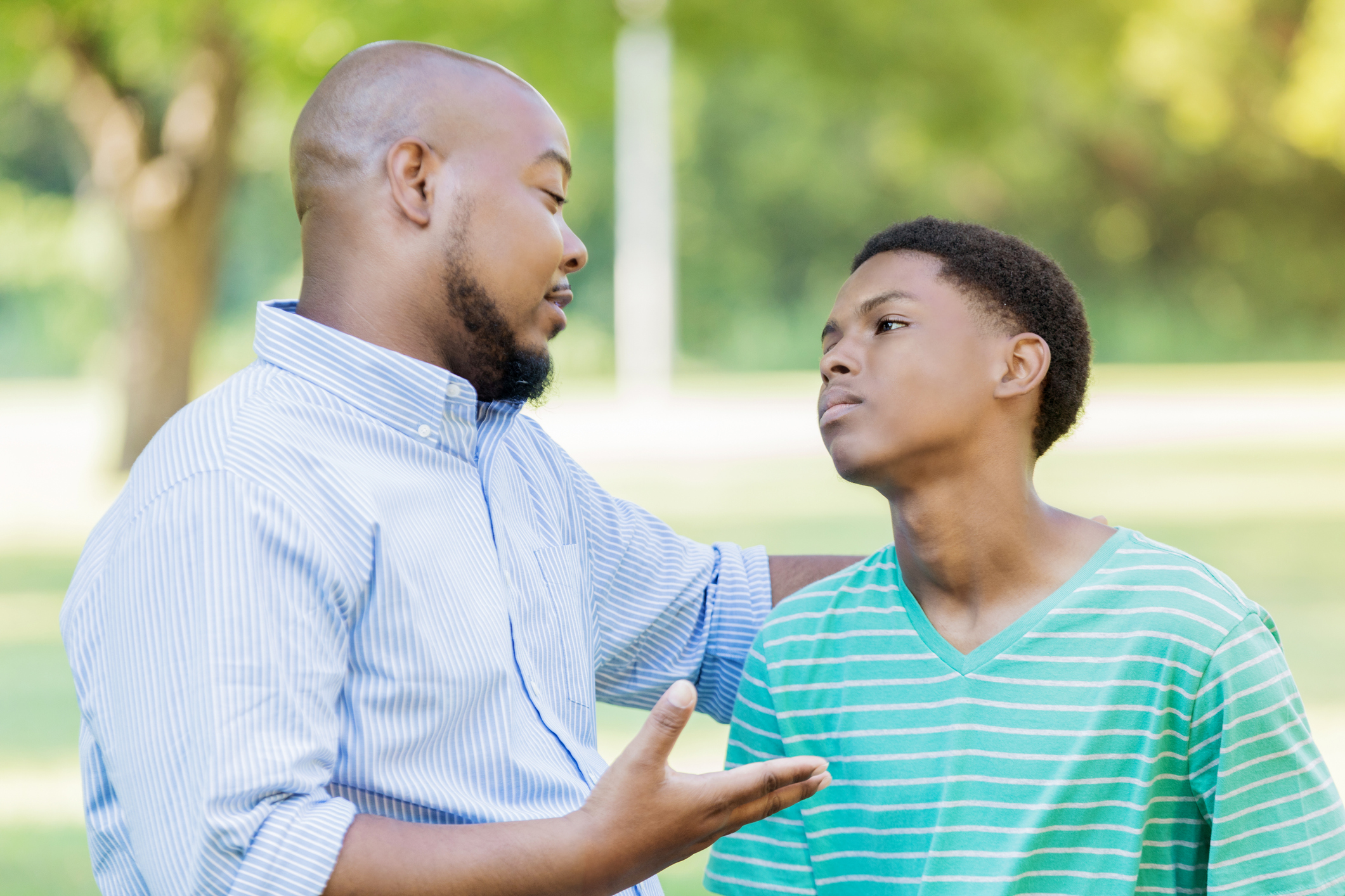 Father disciplines teenage son with extra chores