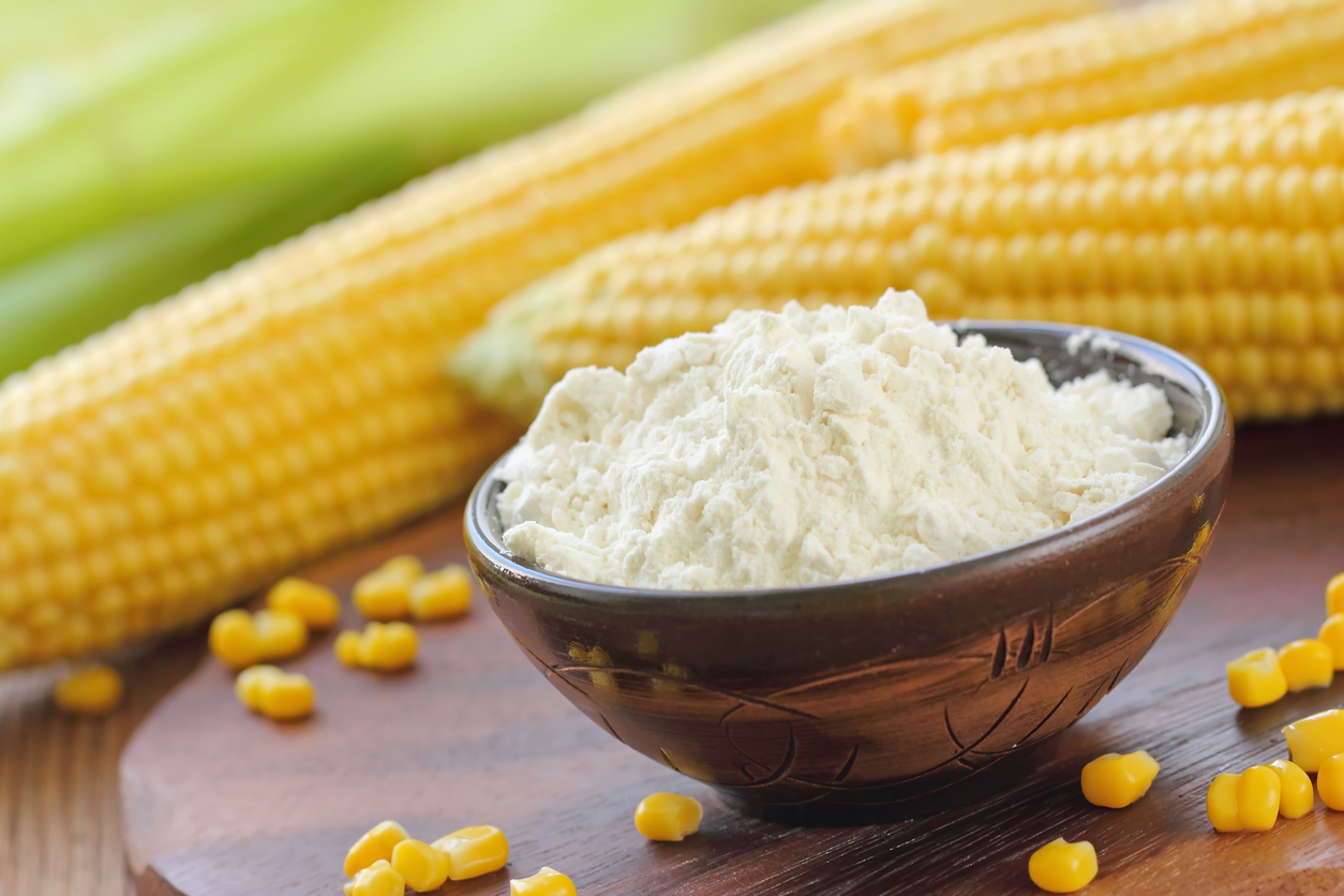 Corn flour and corn cob on the table