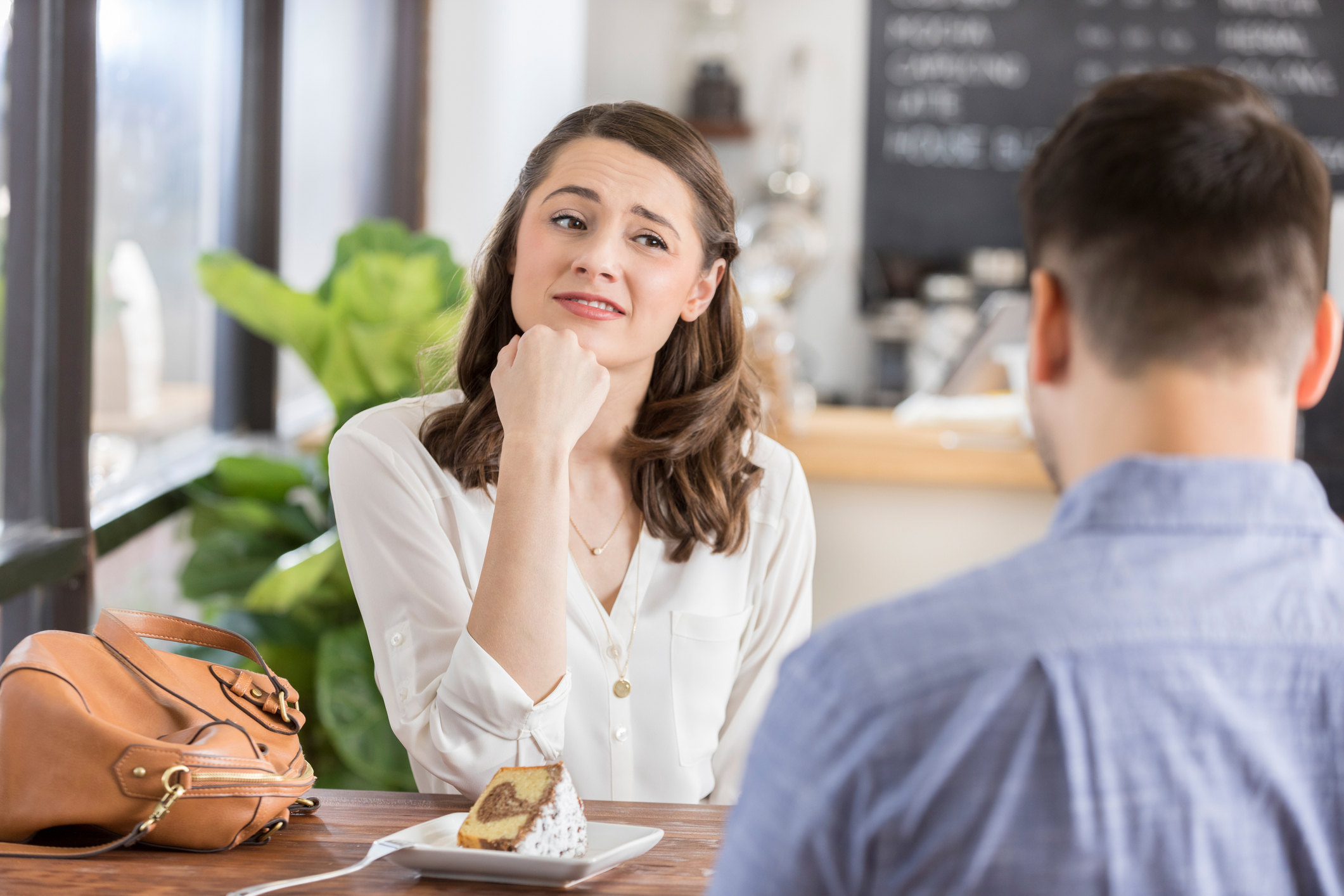 Young woman on a bad blind date