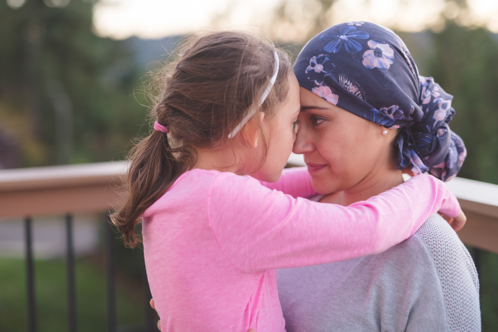 Mother with Cancer Hugging Daughter