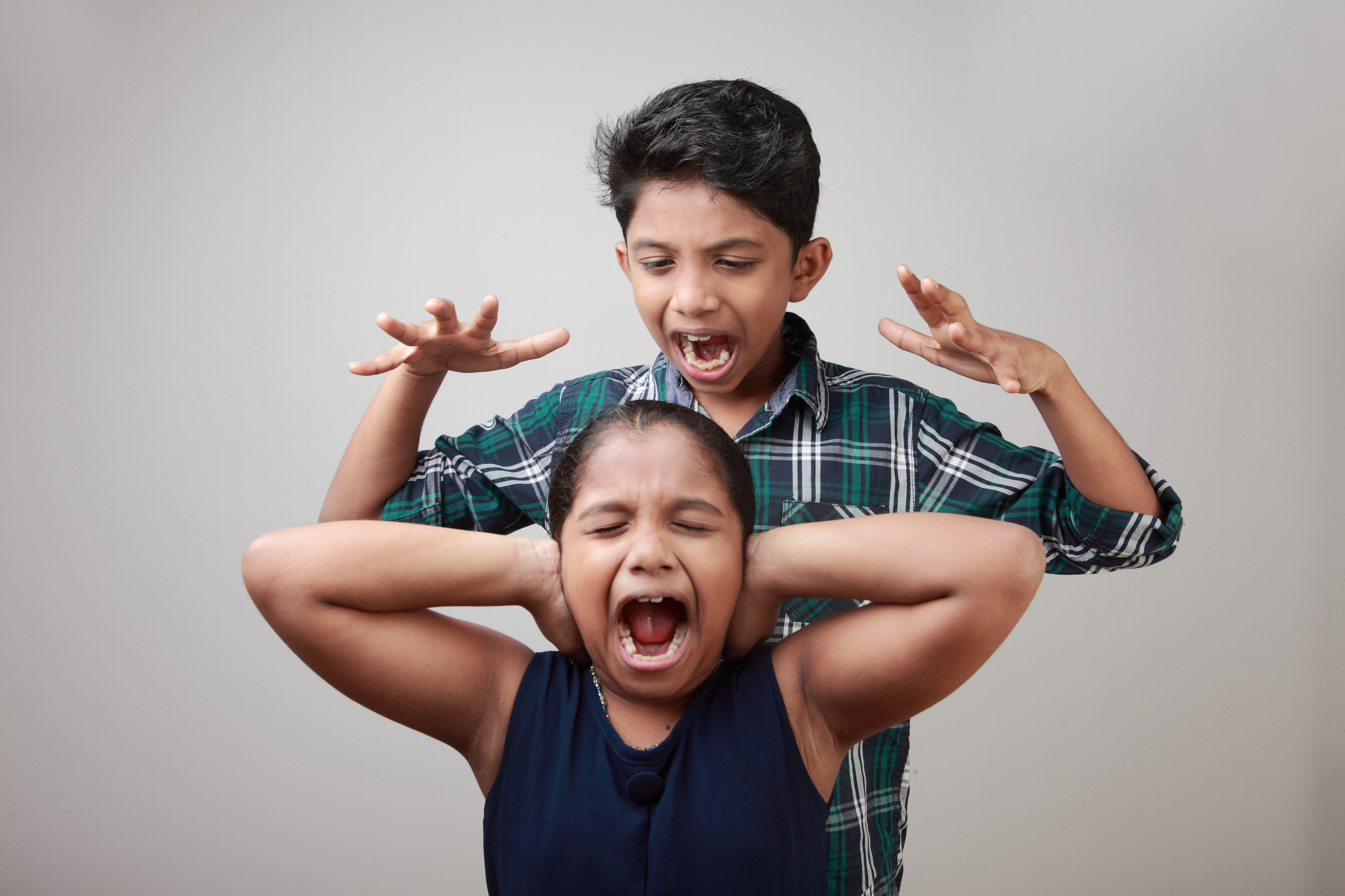 Angry elder brother attacks his sister