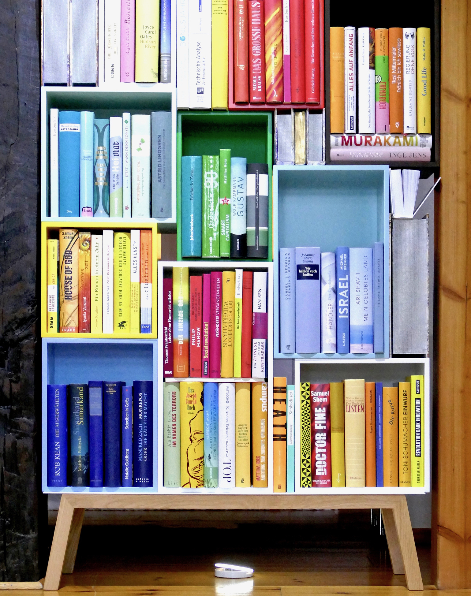 Colorful book shelves packed with books