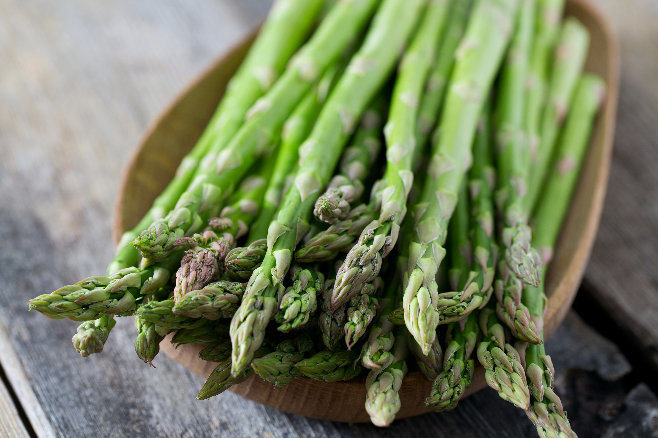 asparagus on wooden surface