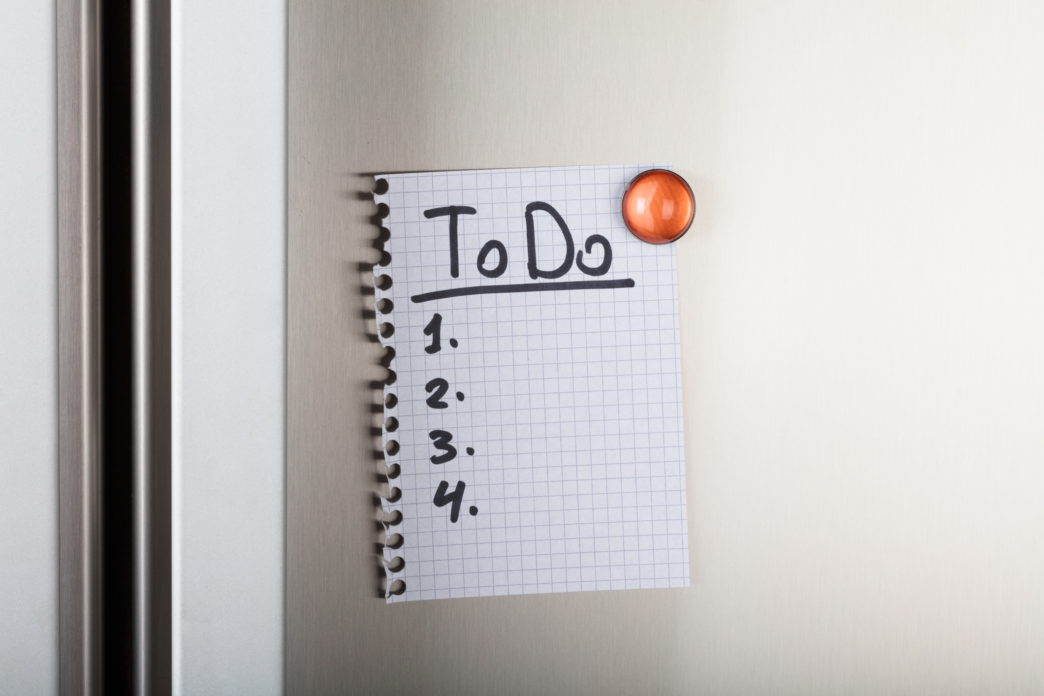 To Do List Attached With Orange Magnetic Thumbtack