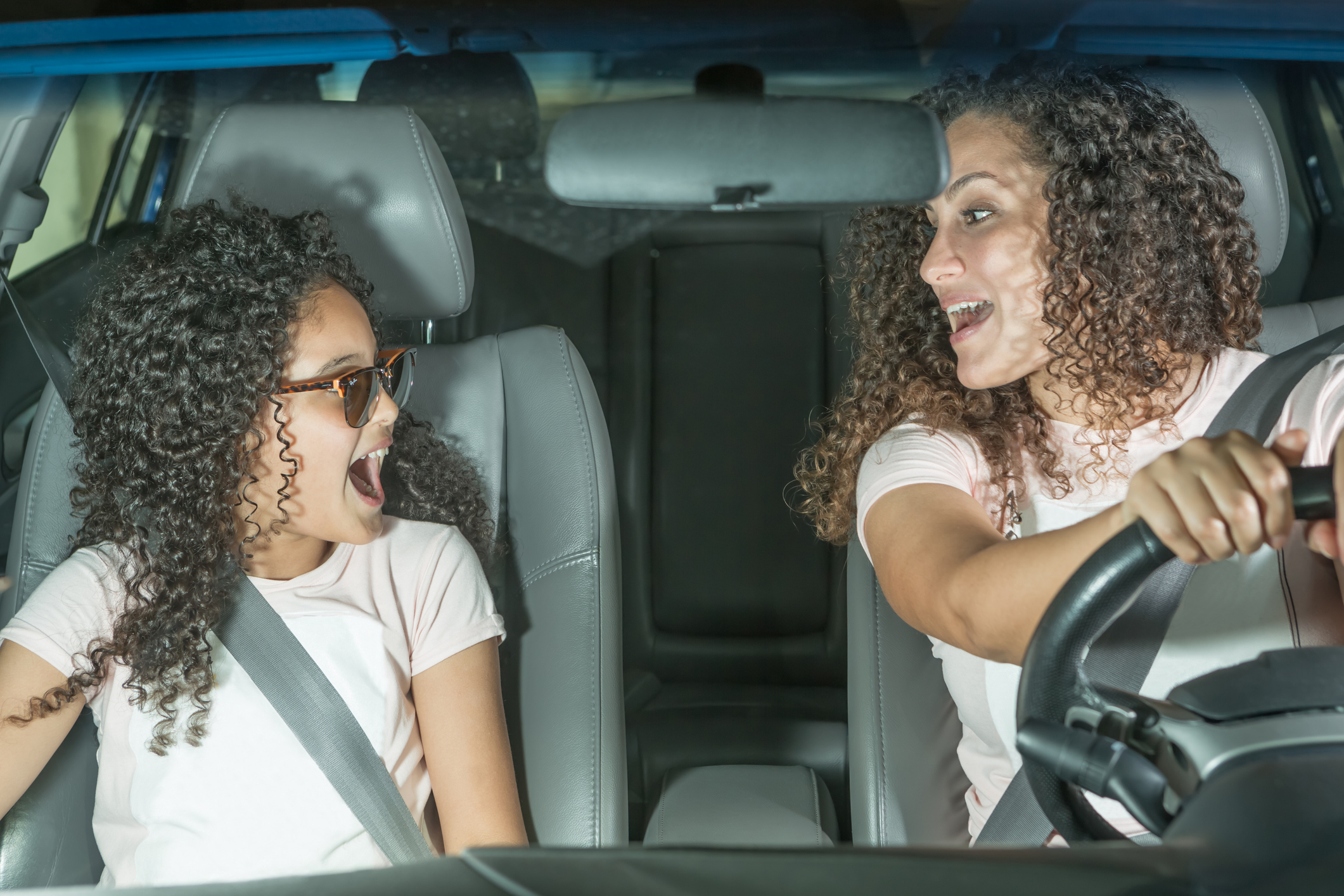 Mother and Daughter Having a Party in the Car