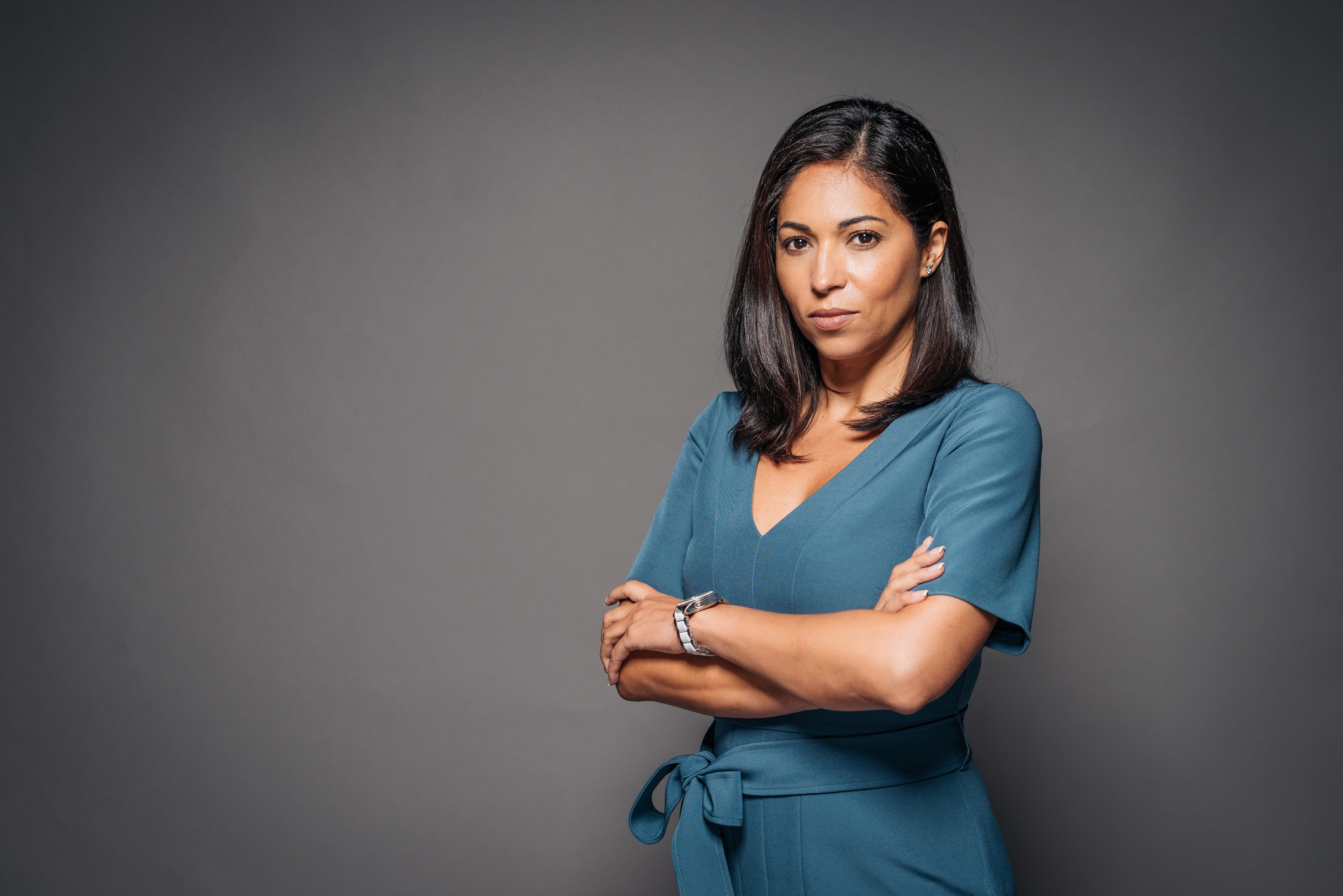 Strong and successful Brazilian woman with arms crossed