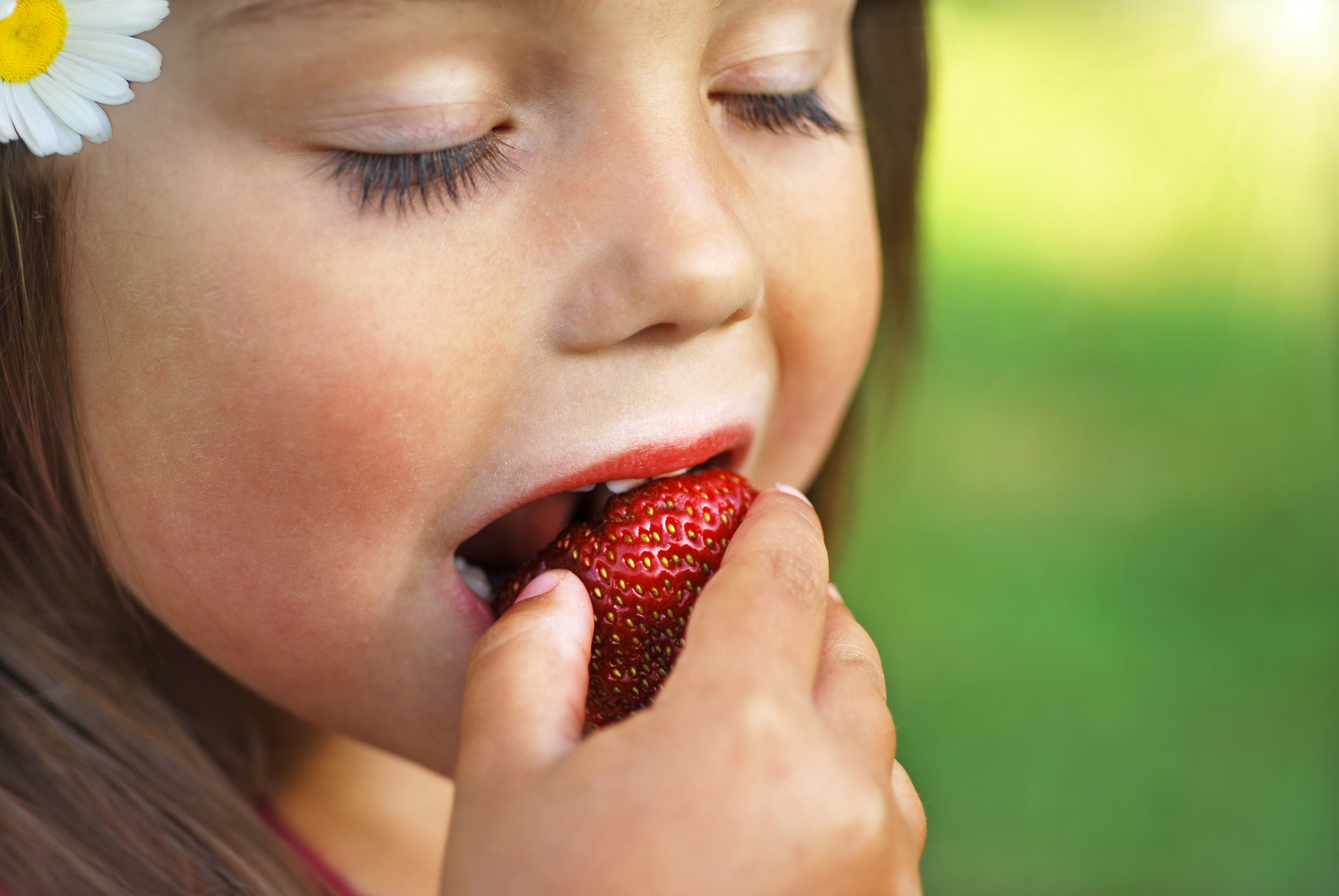 Enjoying delicious strawberry