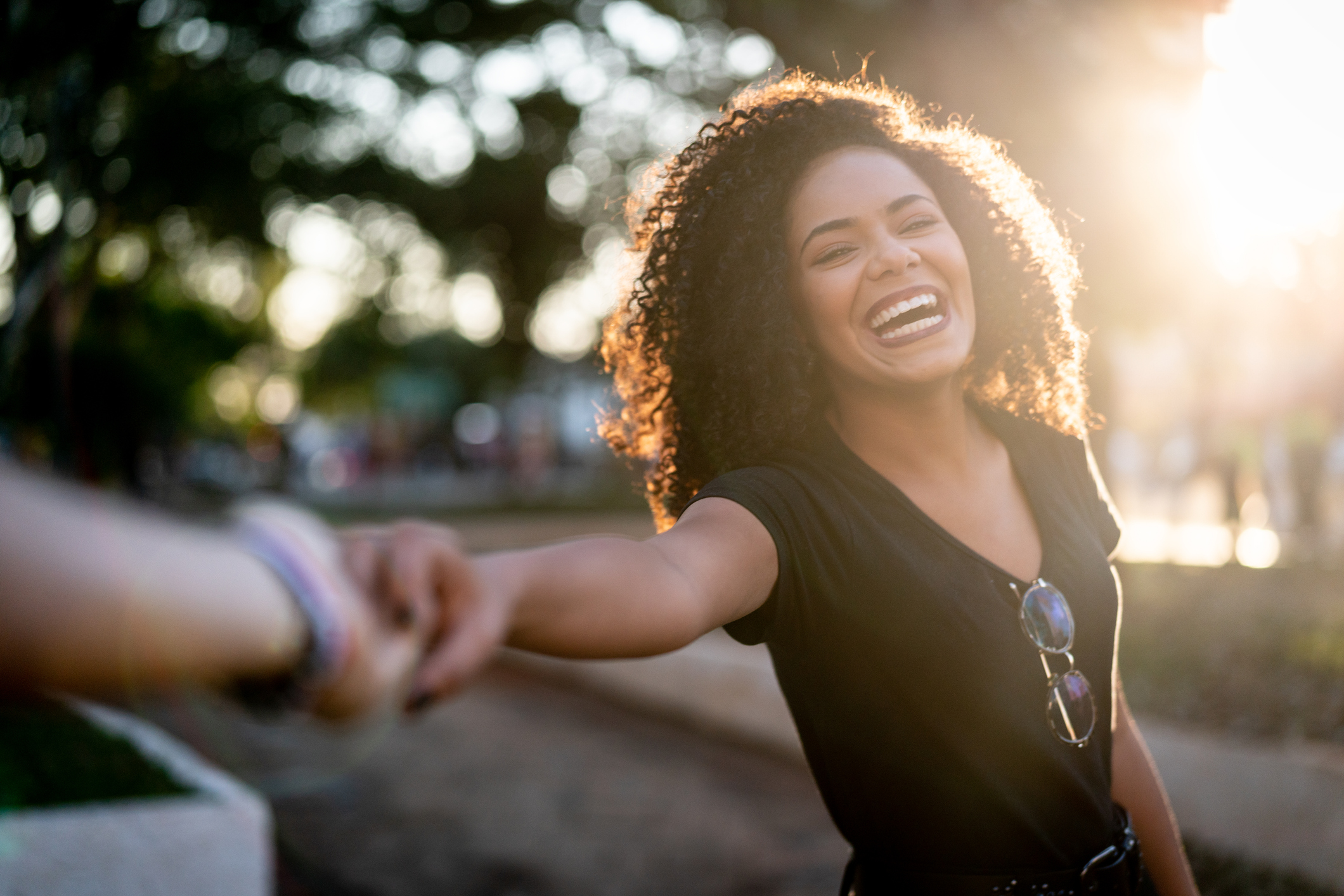 Beautiful Curly Hair Woman Holding Hands/Following Boyfriend