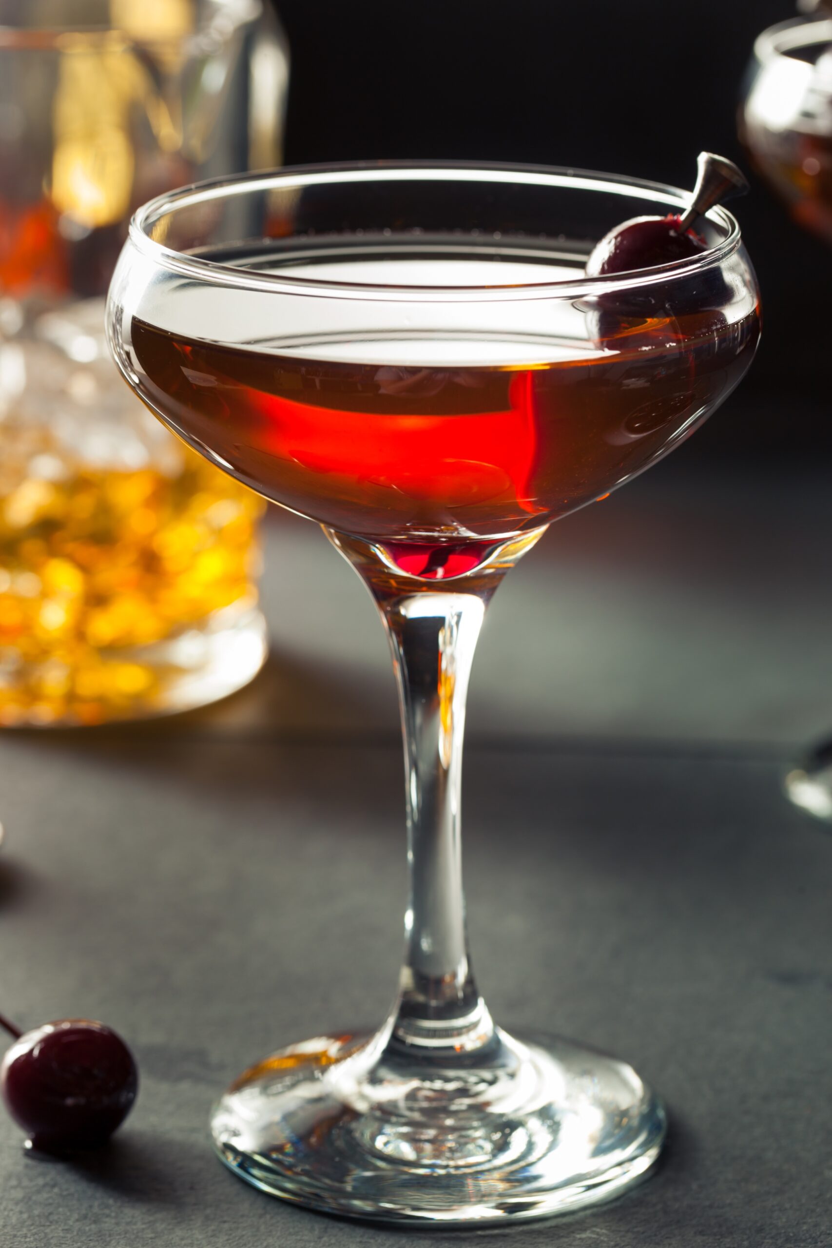 Homemade Rye Bourbon Manhattan with a Cherry Garnish