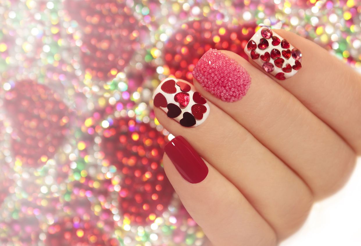 Manicure with hearts.