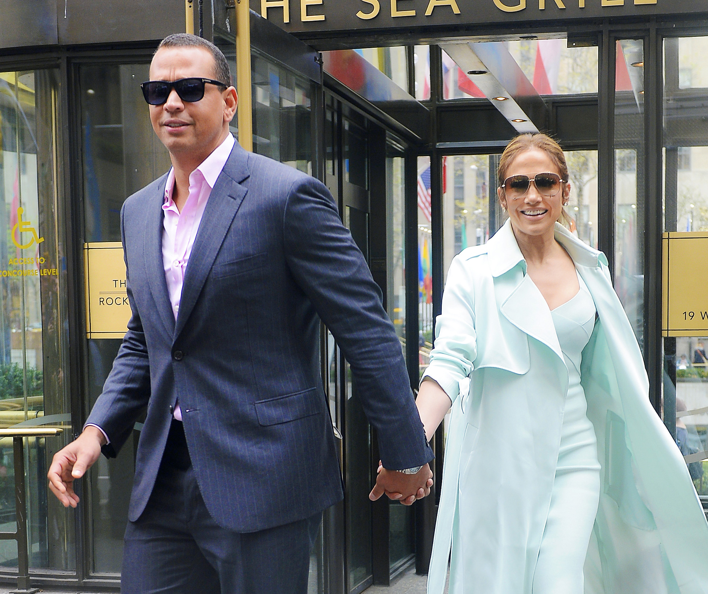 Jennifer Lopez and Alex Rodriuguez are all smiles as they step out hand in hand in NYC