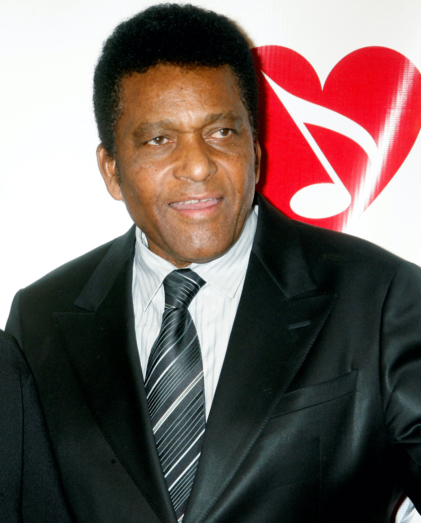 Singer Charley Pride and his wife pose at the 2007 Musicares Person of the Year dinner in LA