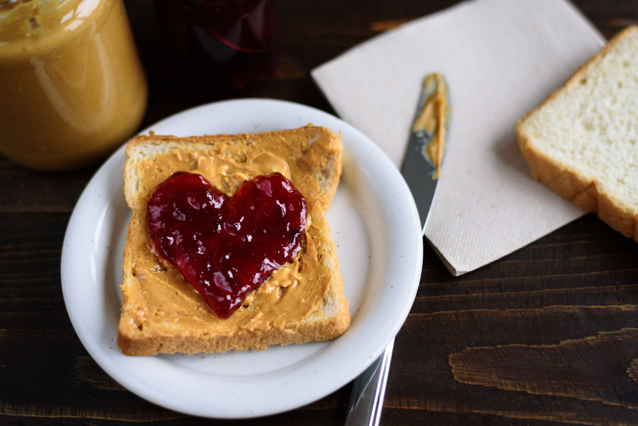 Peanut butter and heart shaped jelly sandwich