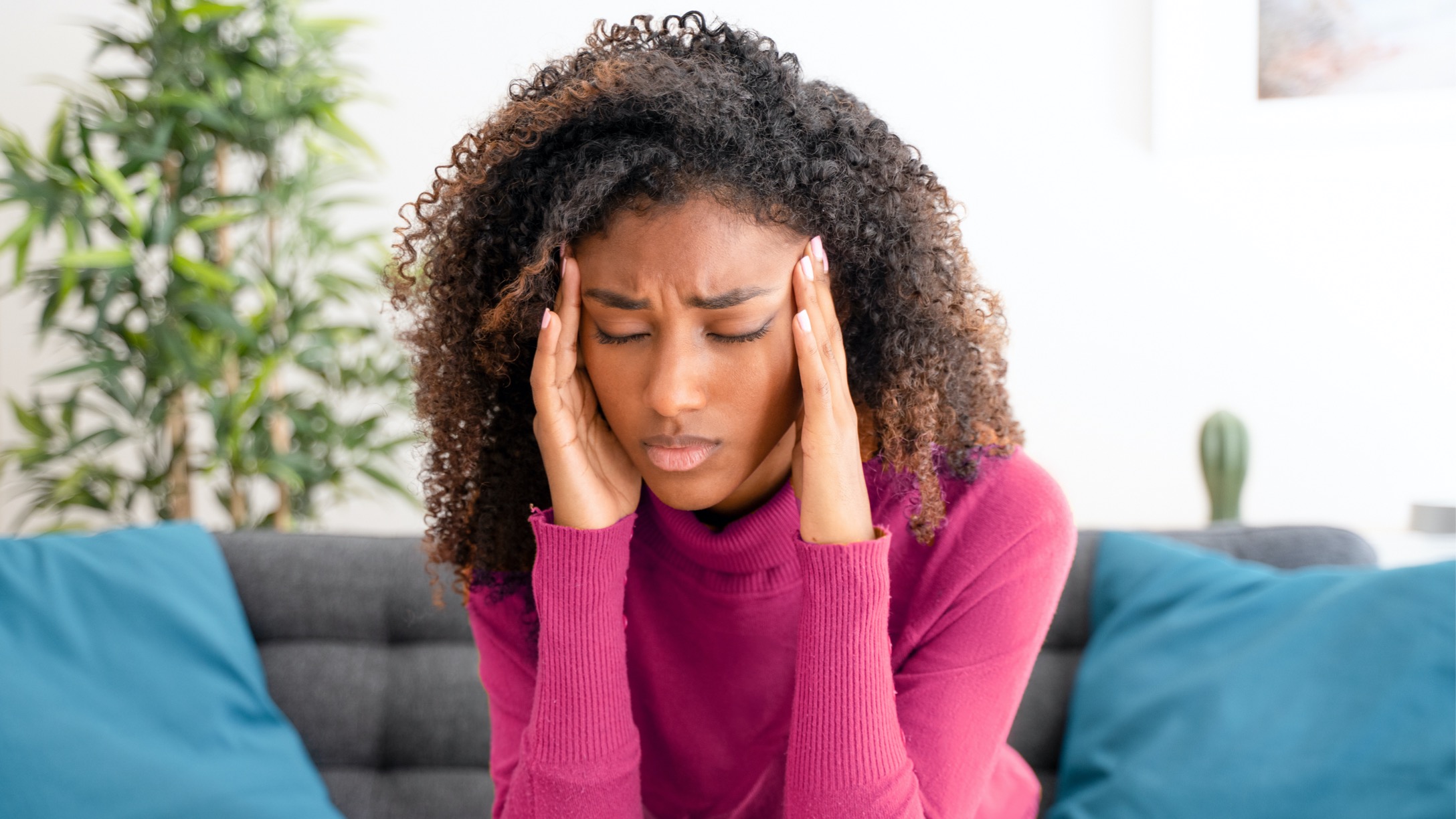 young-black-woman-suffering-bad-and-strong-headache-picture-id1272796778-1.jpg