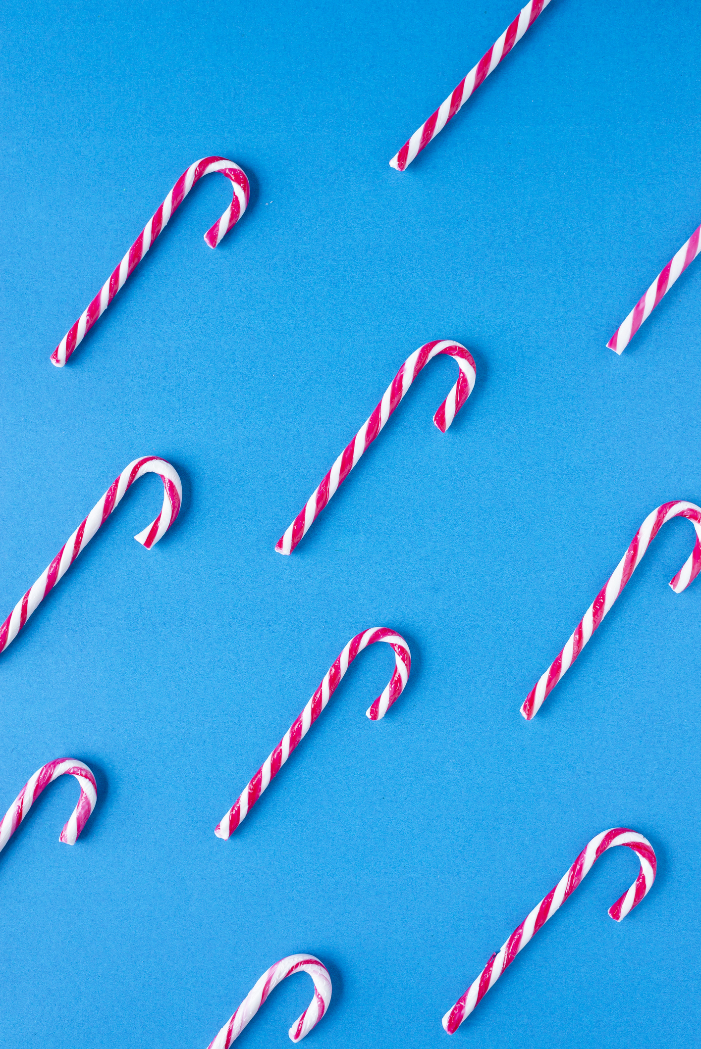 Candy canes on blue background