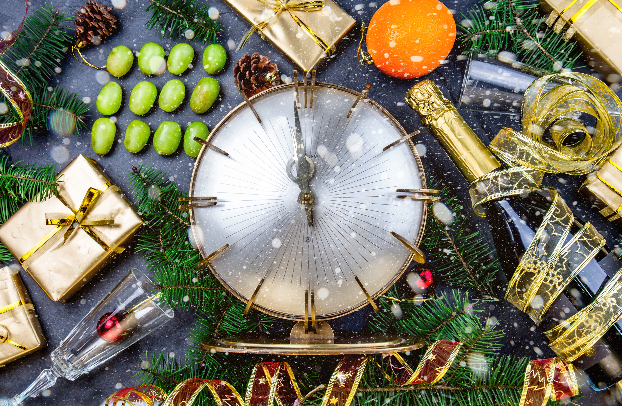 NEW YEAR TRADITION. Latin American and Spanish New Year traditional. Funny ritual to eat twelve 12 grapes for good luck at midnigth. Flat lay, top view. Christmas New Year composition.