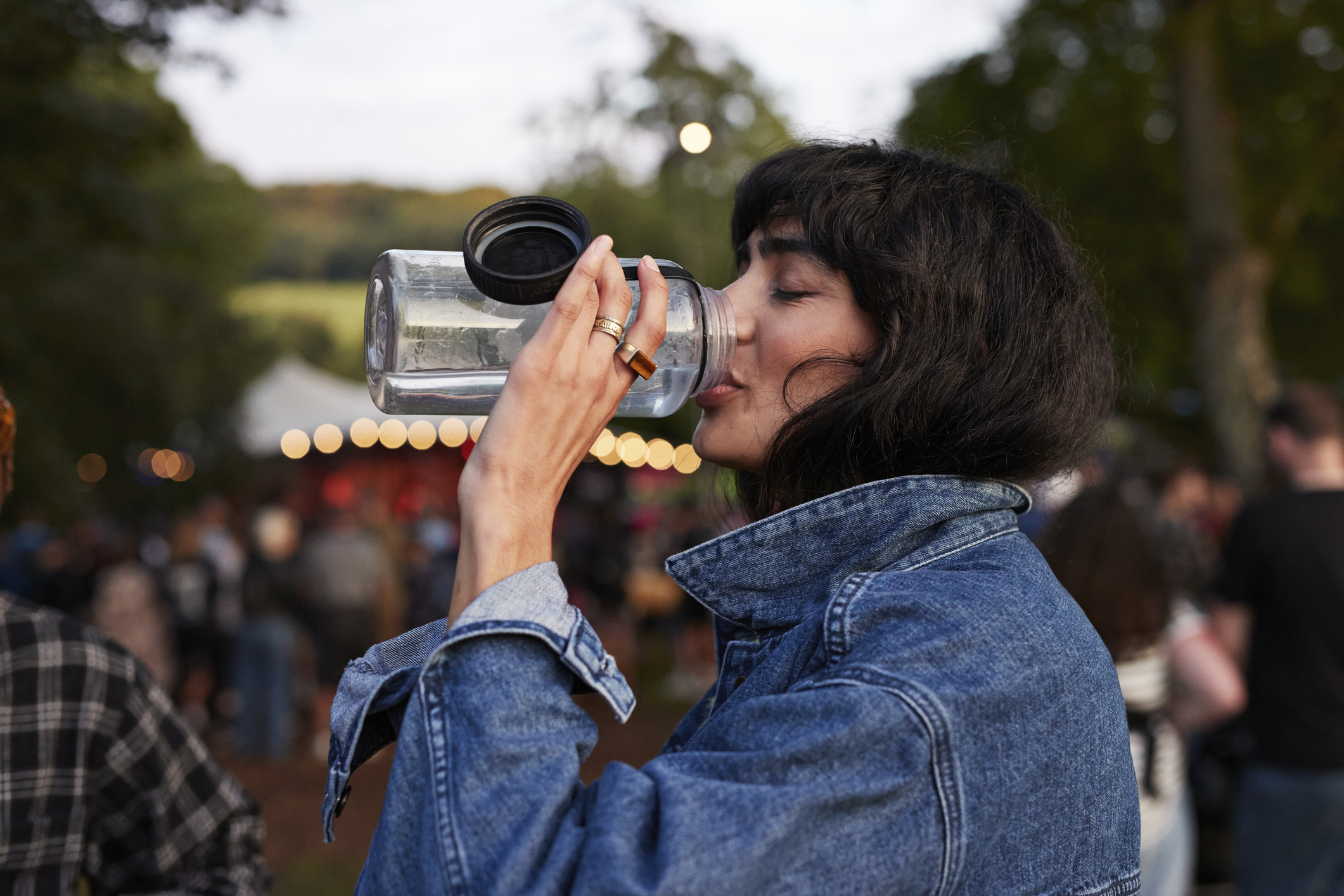 Woman drinking water from bottle