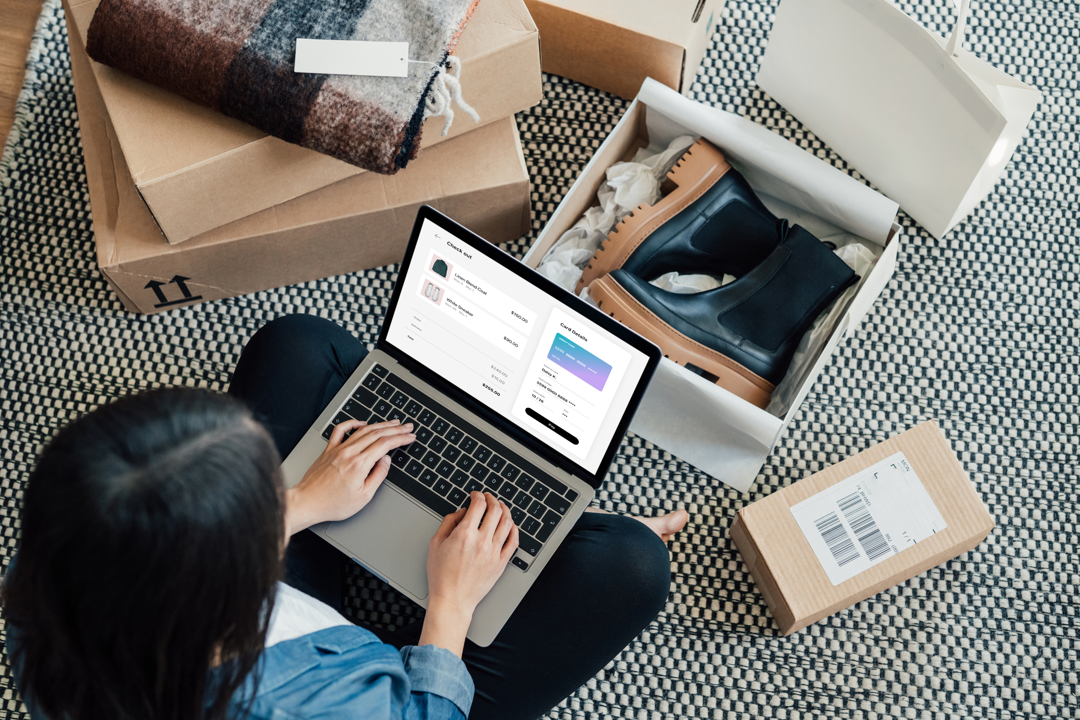 Overhead View Of Young Woman Doing Online Shopping With Laptop